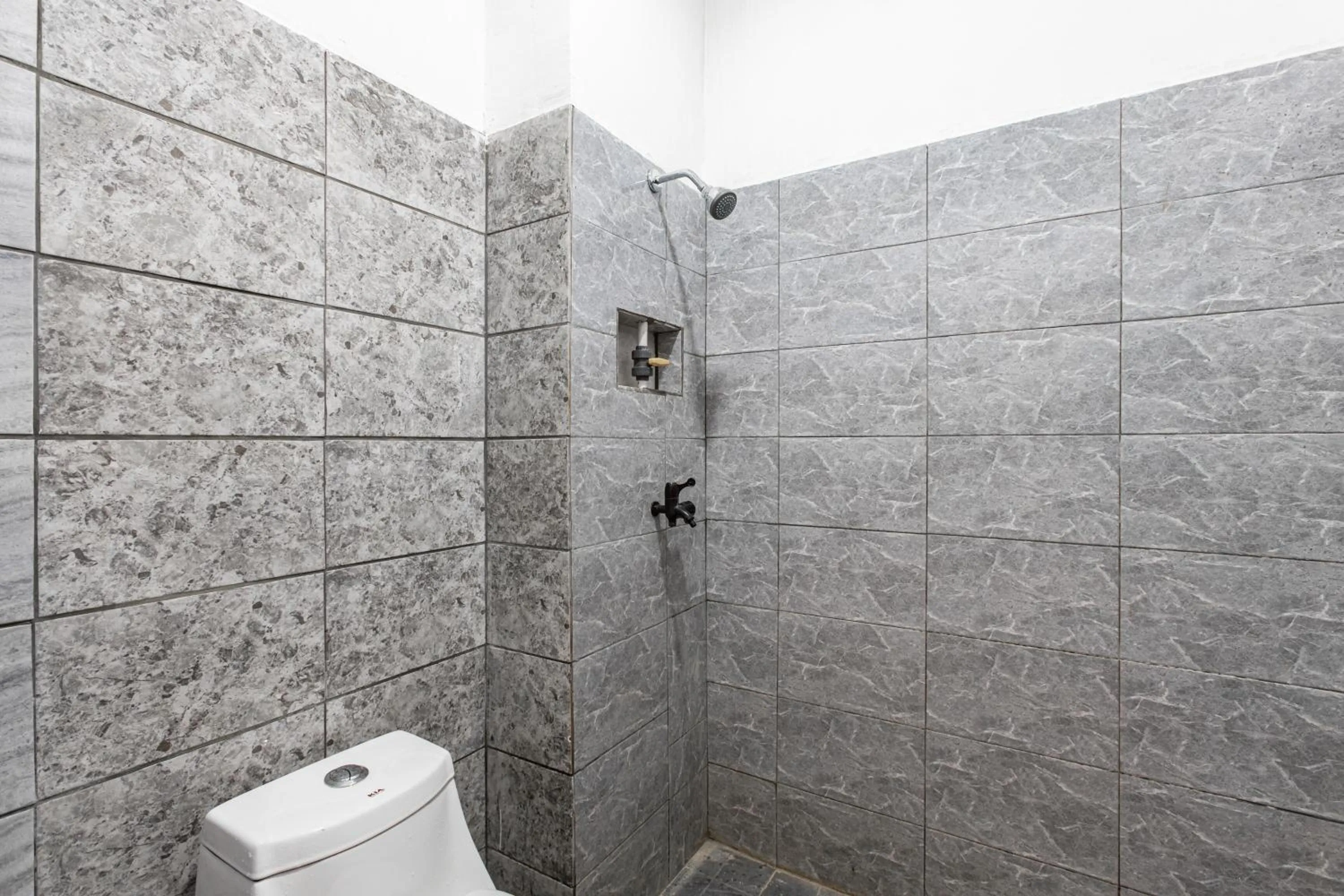 Bathroom in Hotel O Guest House Maria