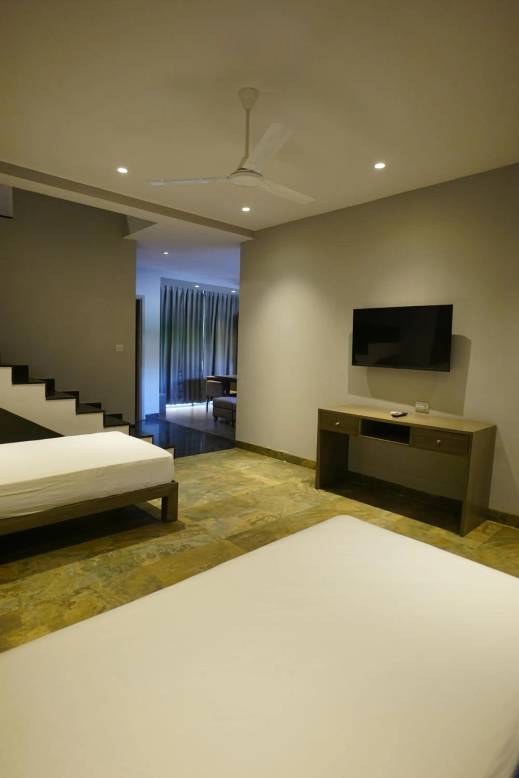 Bed in The Augusta Club & Resort