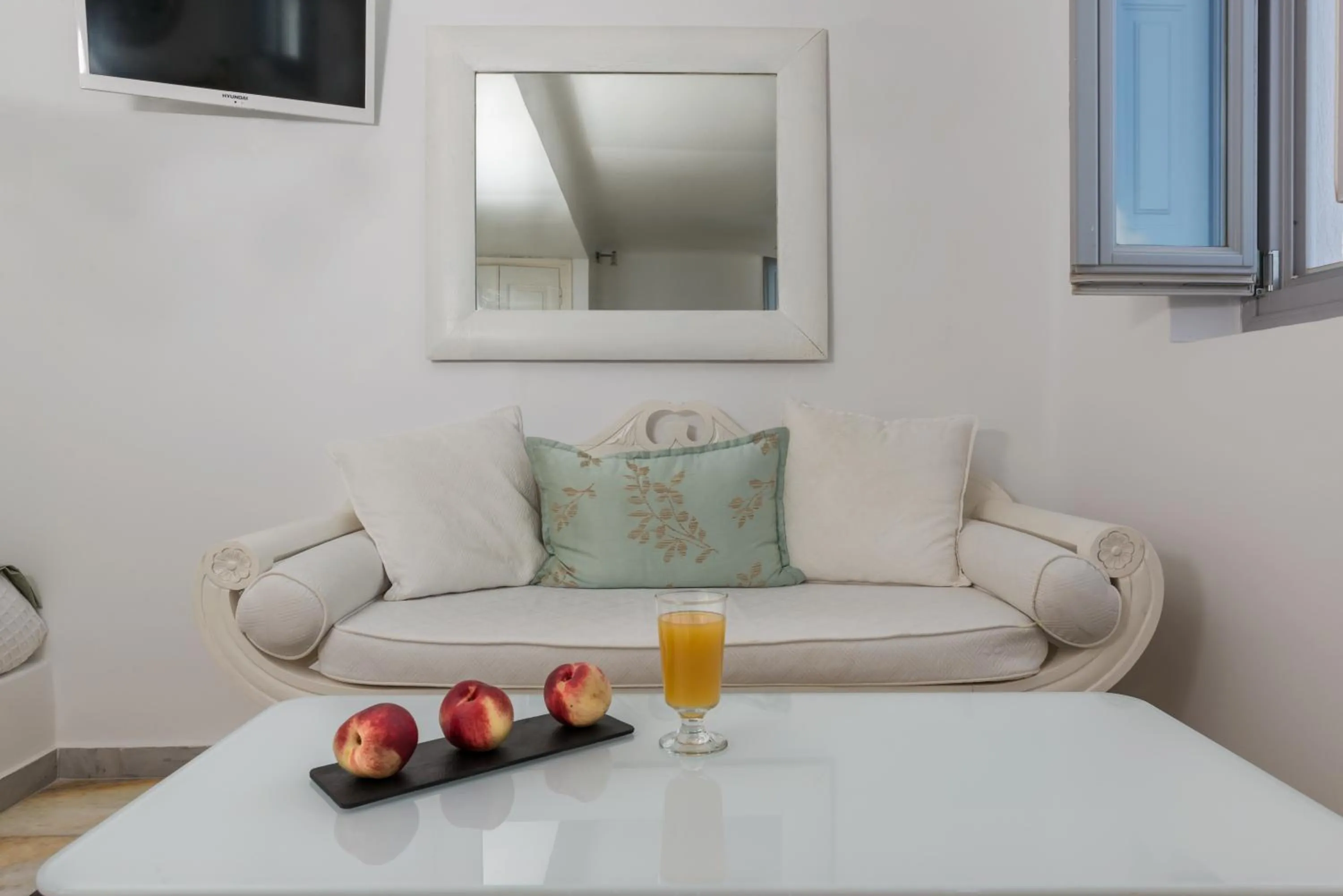 Seating area in Iliovasilema Suites