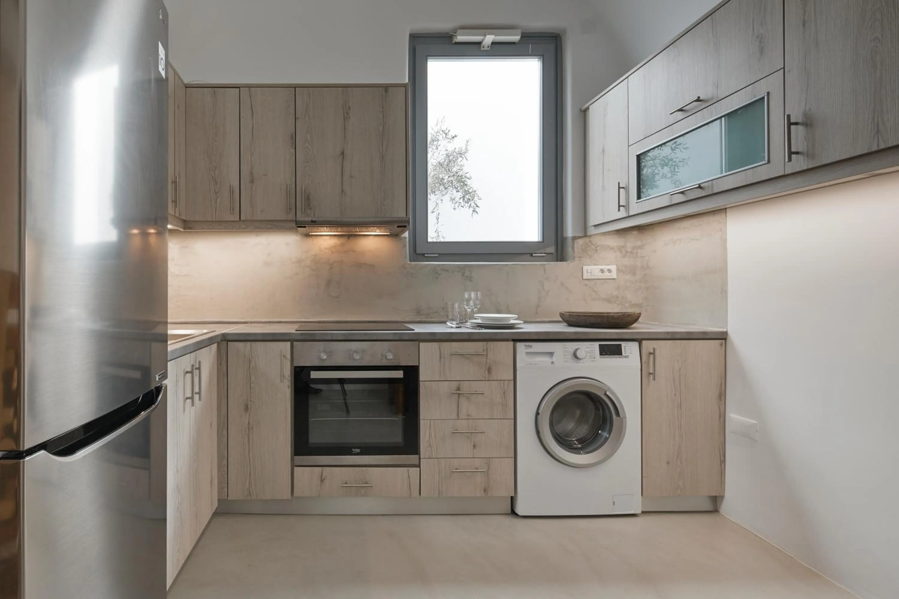 Kitchen or kitchenette in Iliovasilema Suites