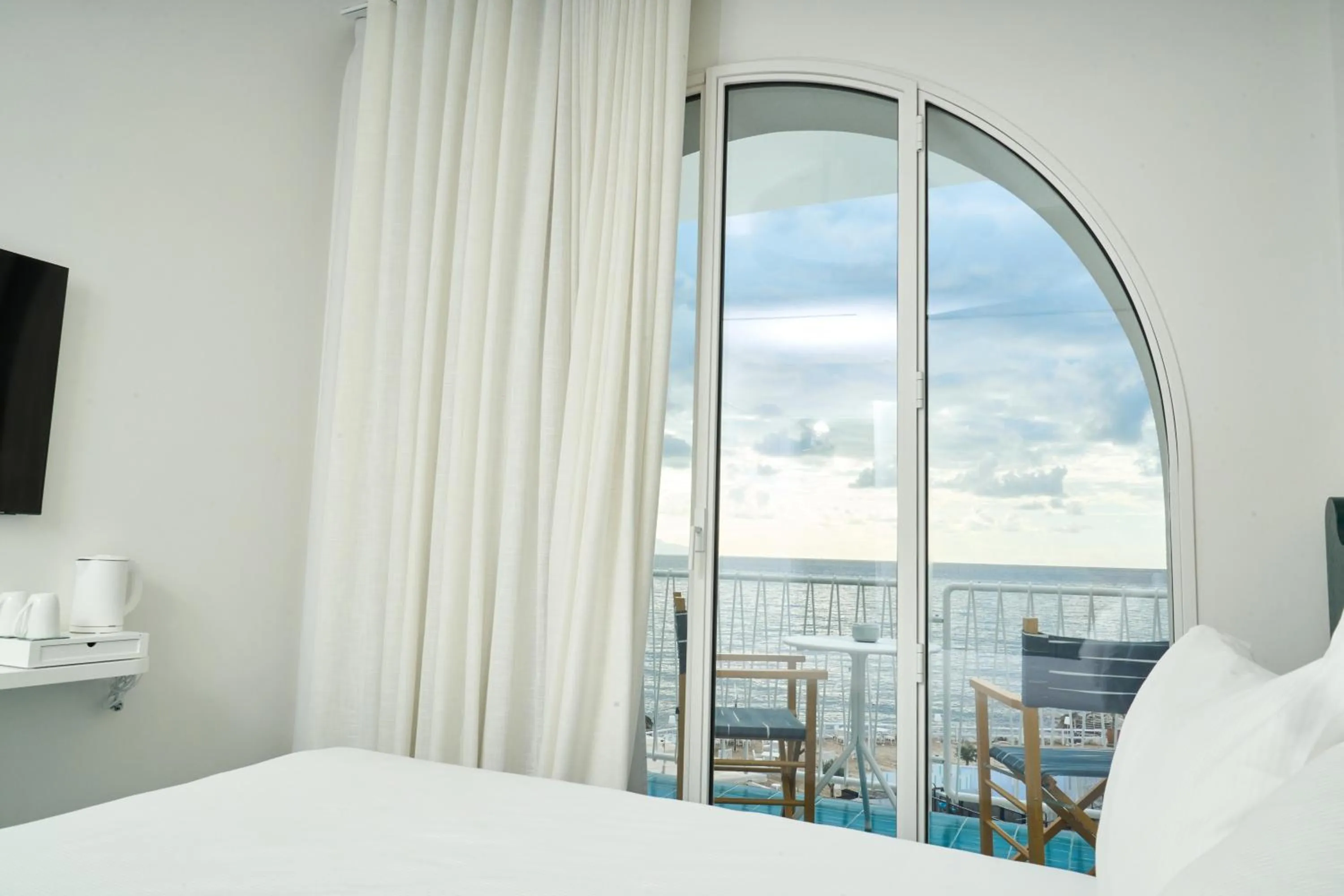 Bed in CALEA Boutique Hotel