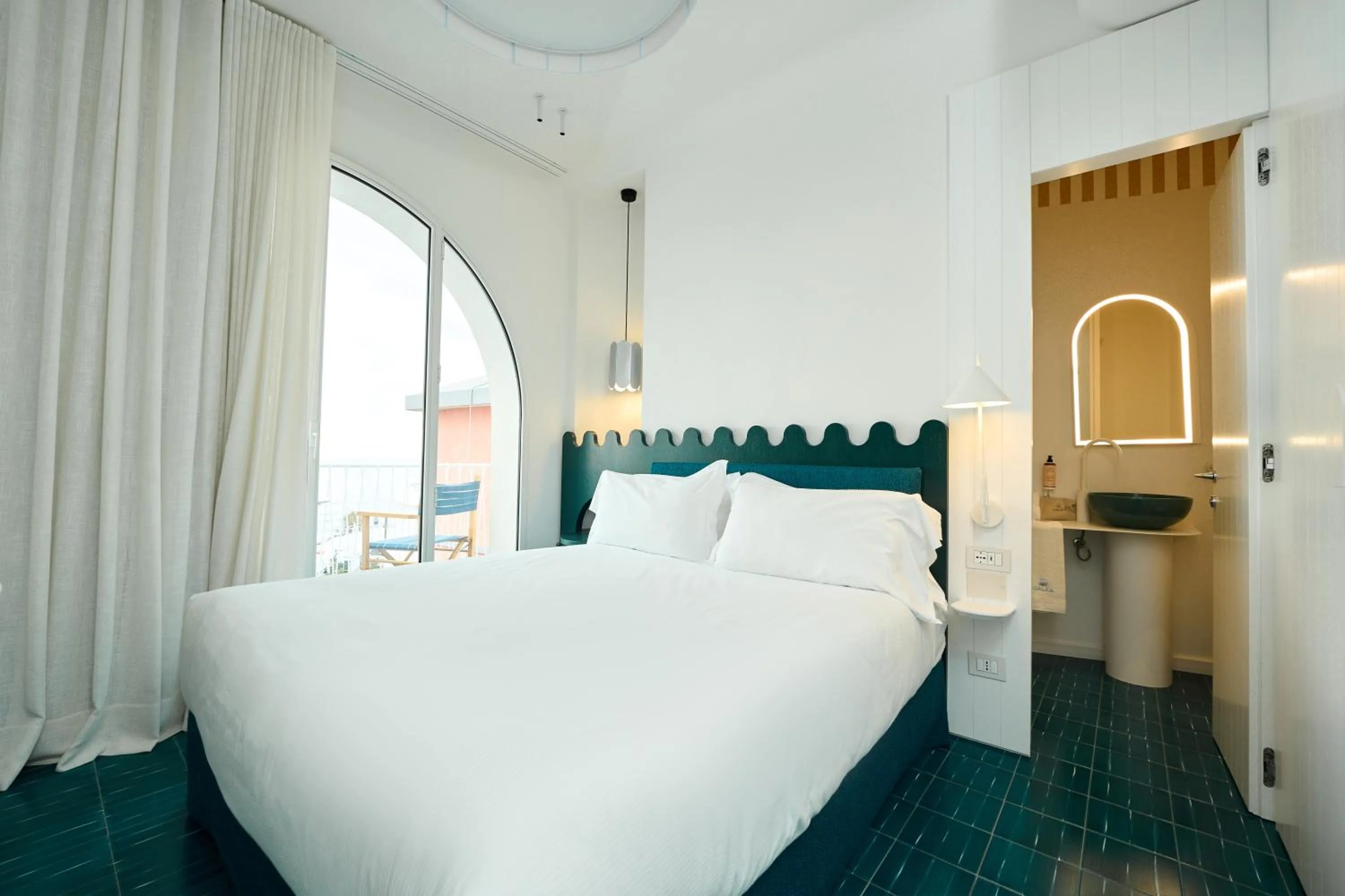 Bed in CALEA Boutique Hotel