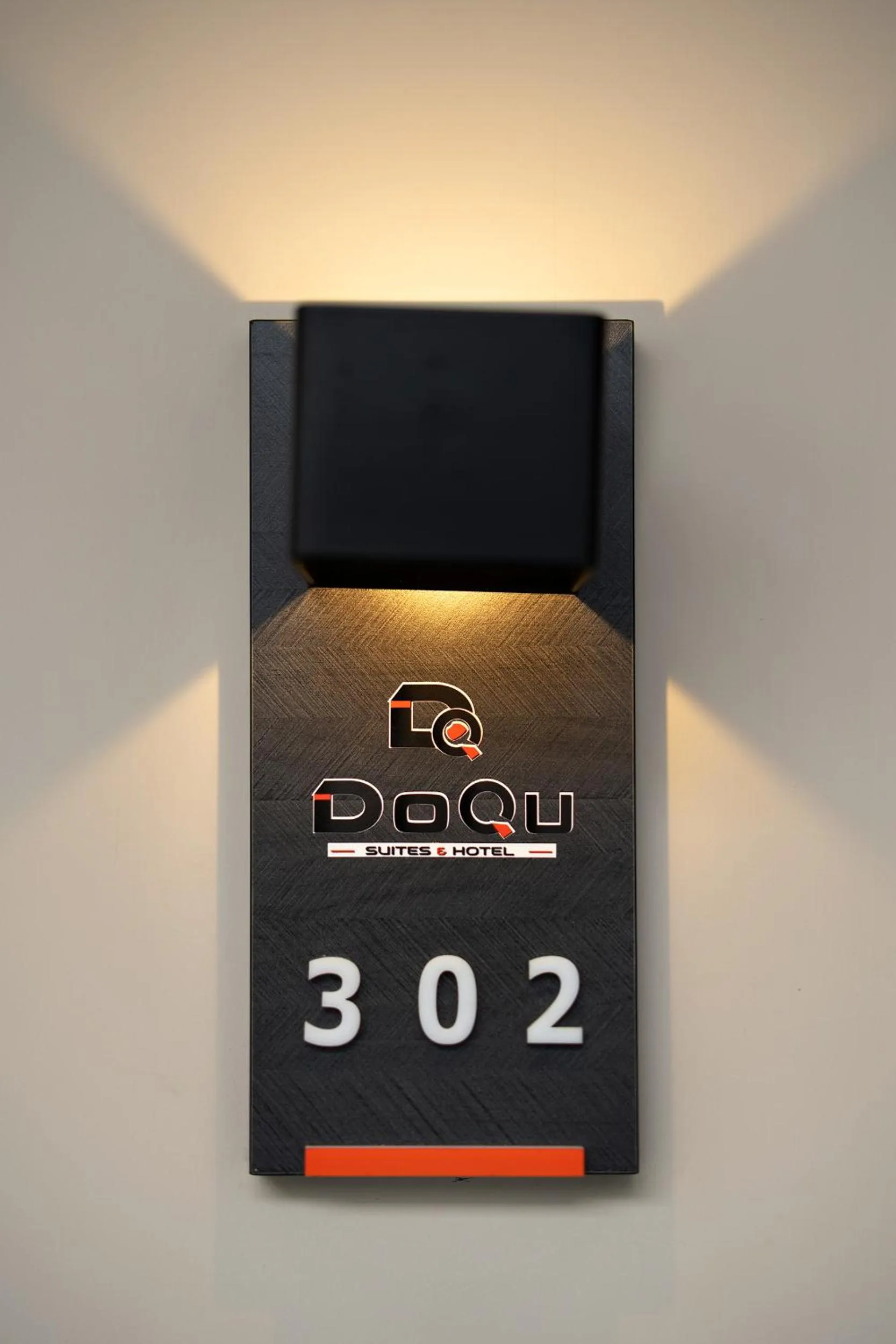 Property logo or sign in Doqu Suites Hotel
