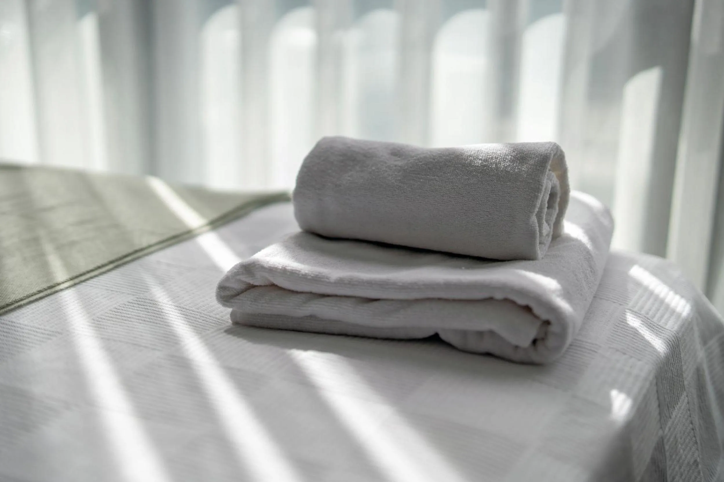 Bed in Doqu Suites Hotel