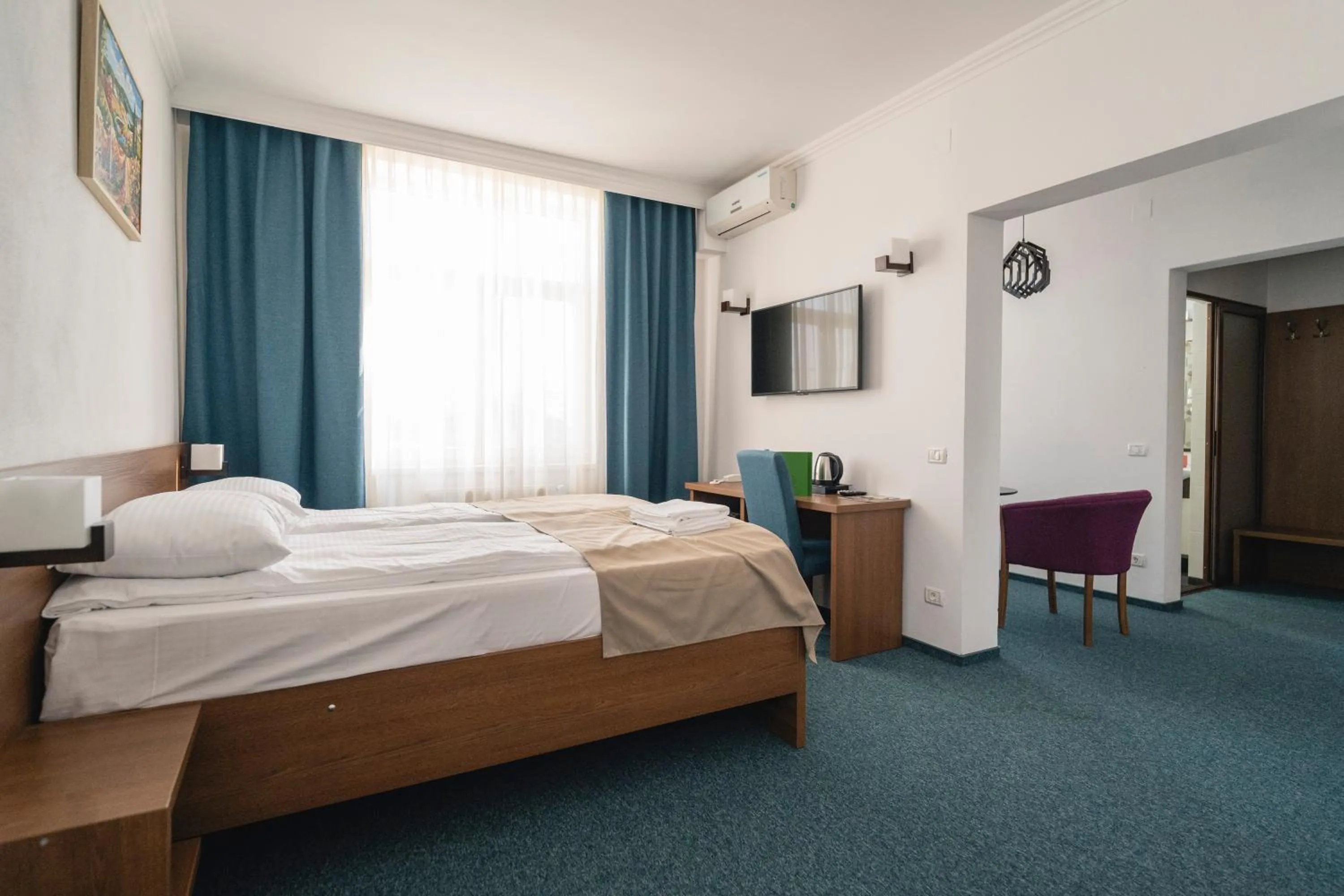 Bed in Hotel Comat Deva