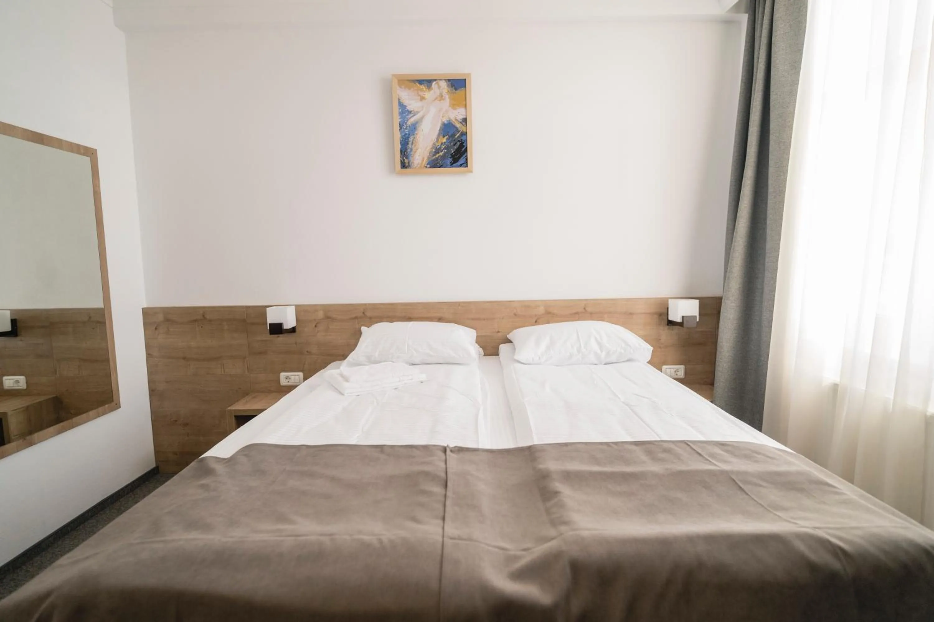 Bed in Hotel Comat Deva