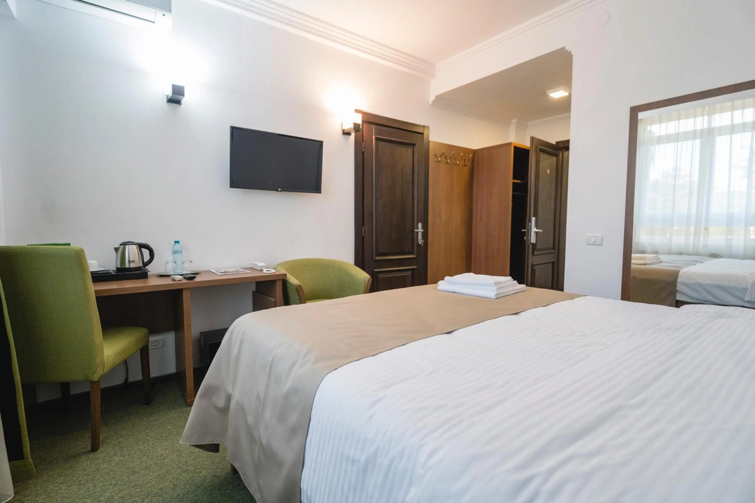 Bed in Hotel Comat Deva