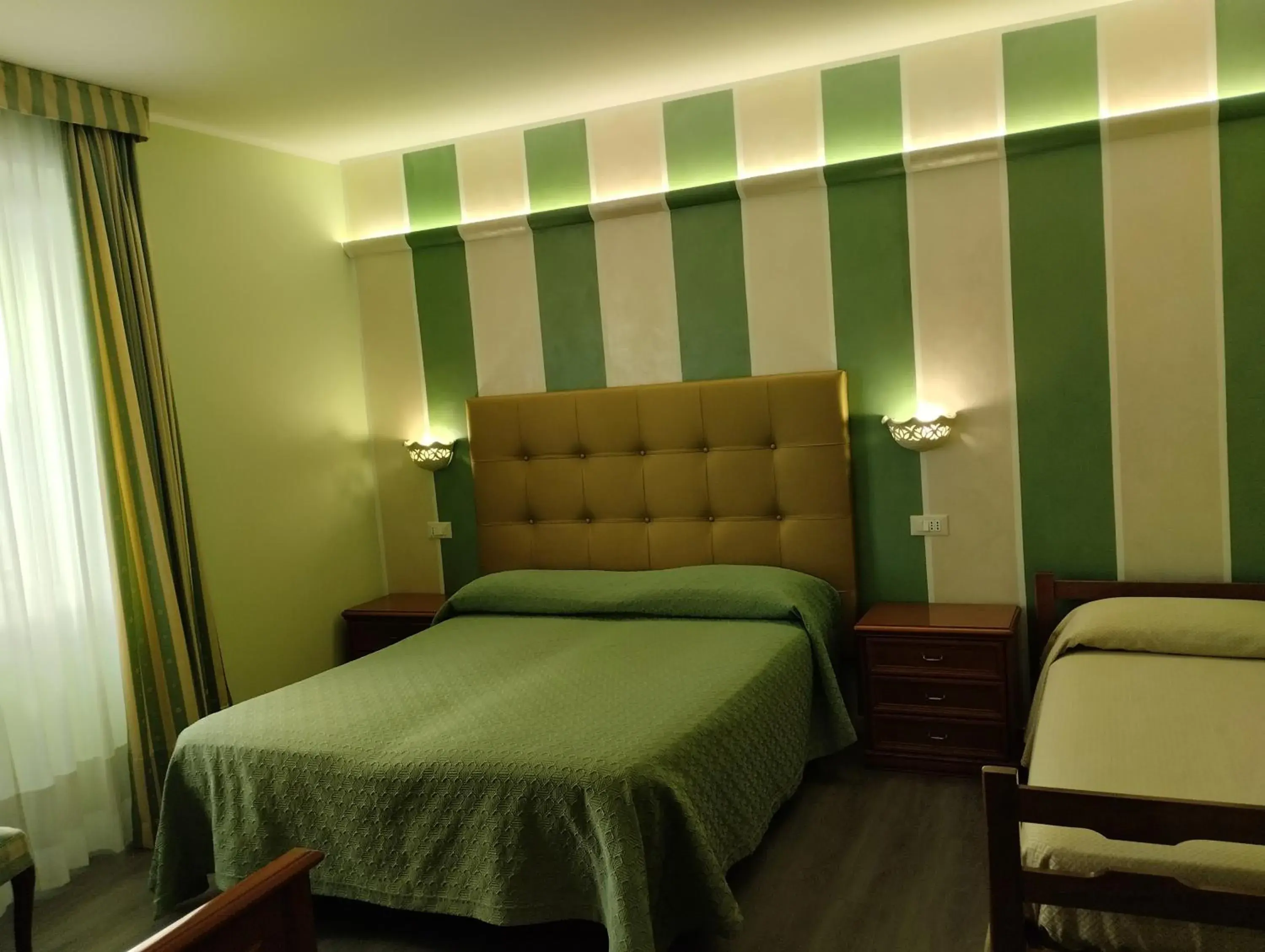 Quadruple Room - single occupancy in Hotel Tiffany Quadruple Room - single occupancy in Hotel Tiffany