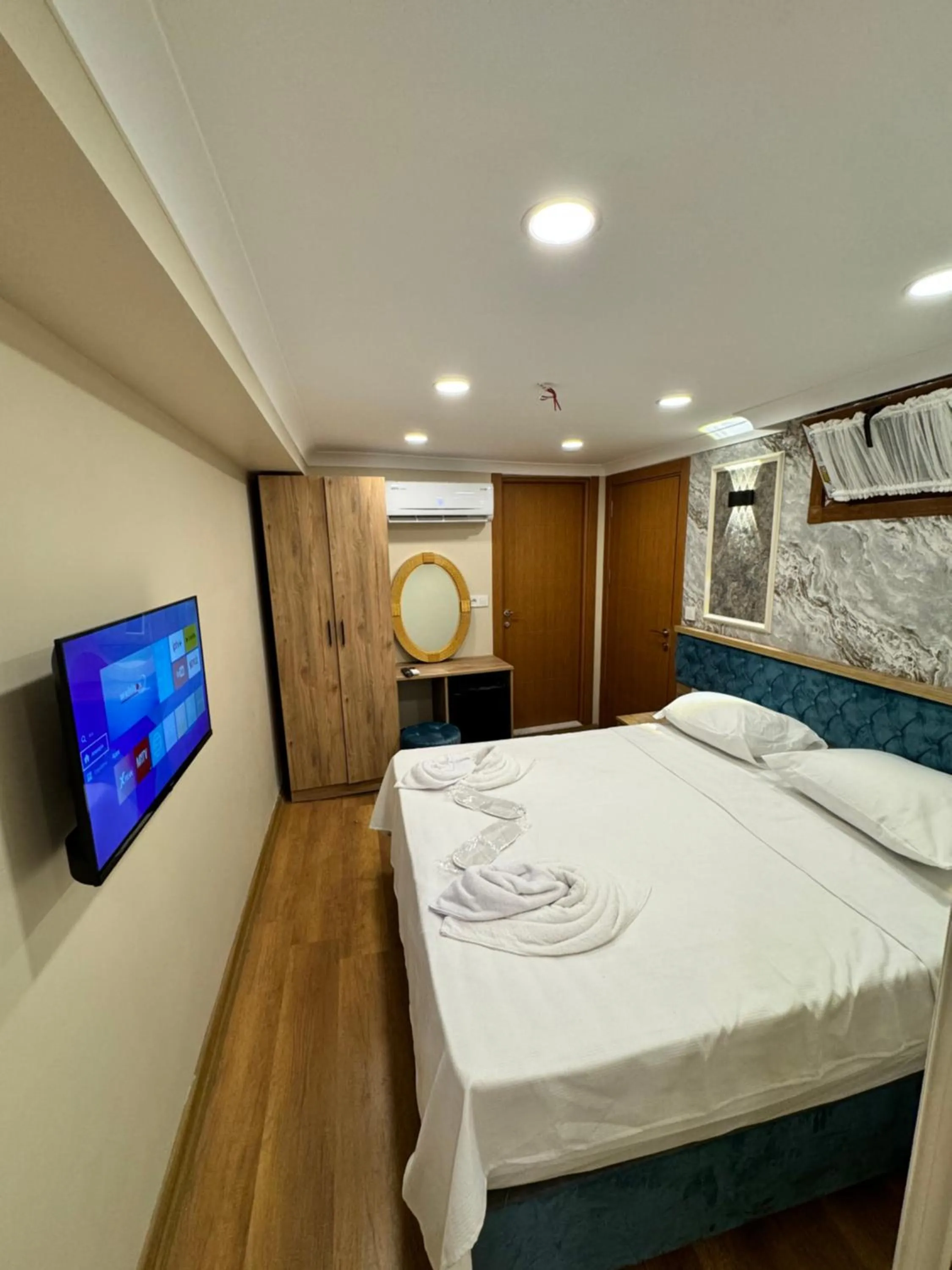 Bed in Riverside Hotel