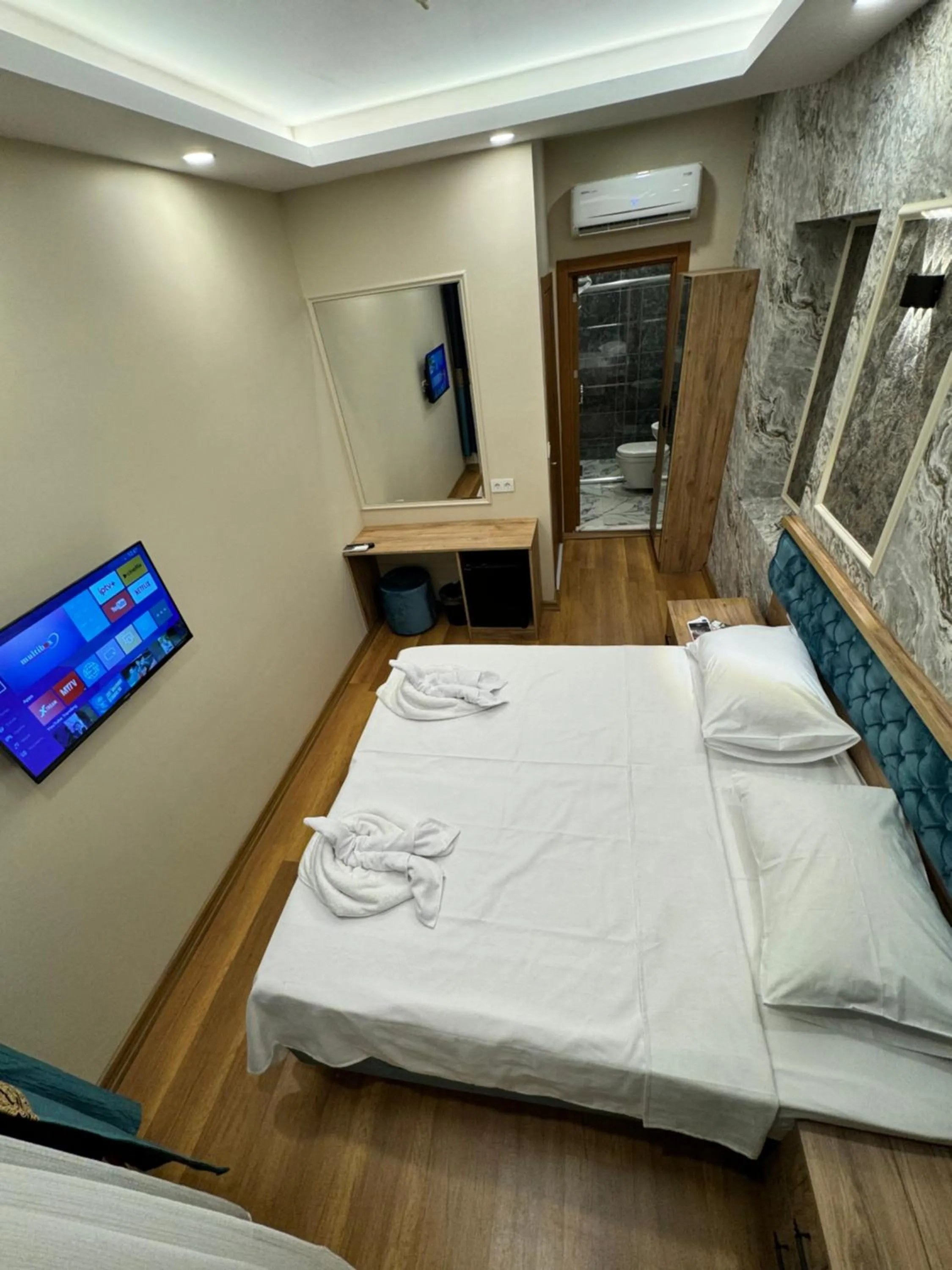 Bed in Riverside Hotel