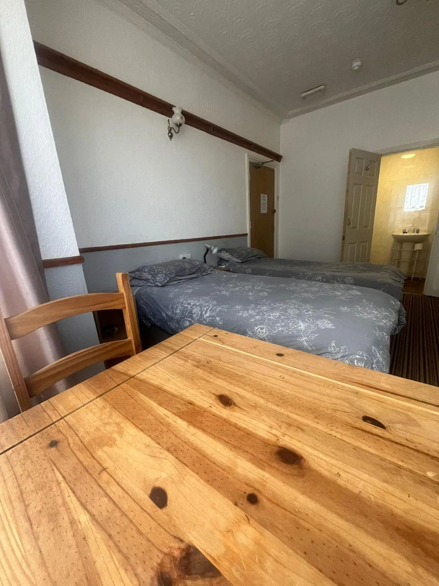 Photo of the whole room, Bed in Moonside Rooms