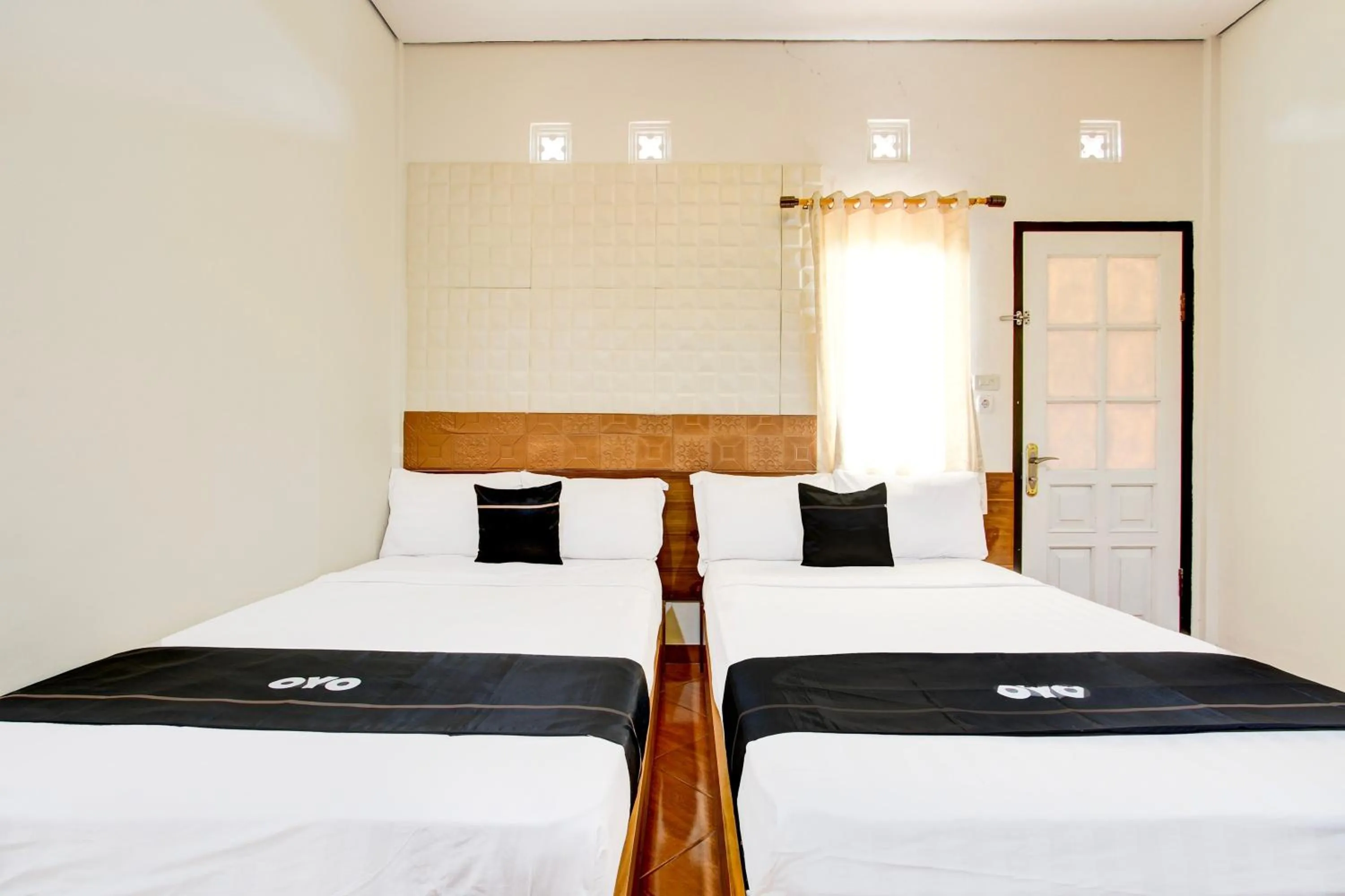 Bedroom in Capital O 93994 Dalem Kamulyan Syariah Guest House