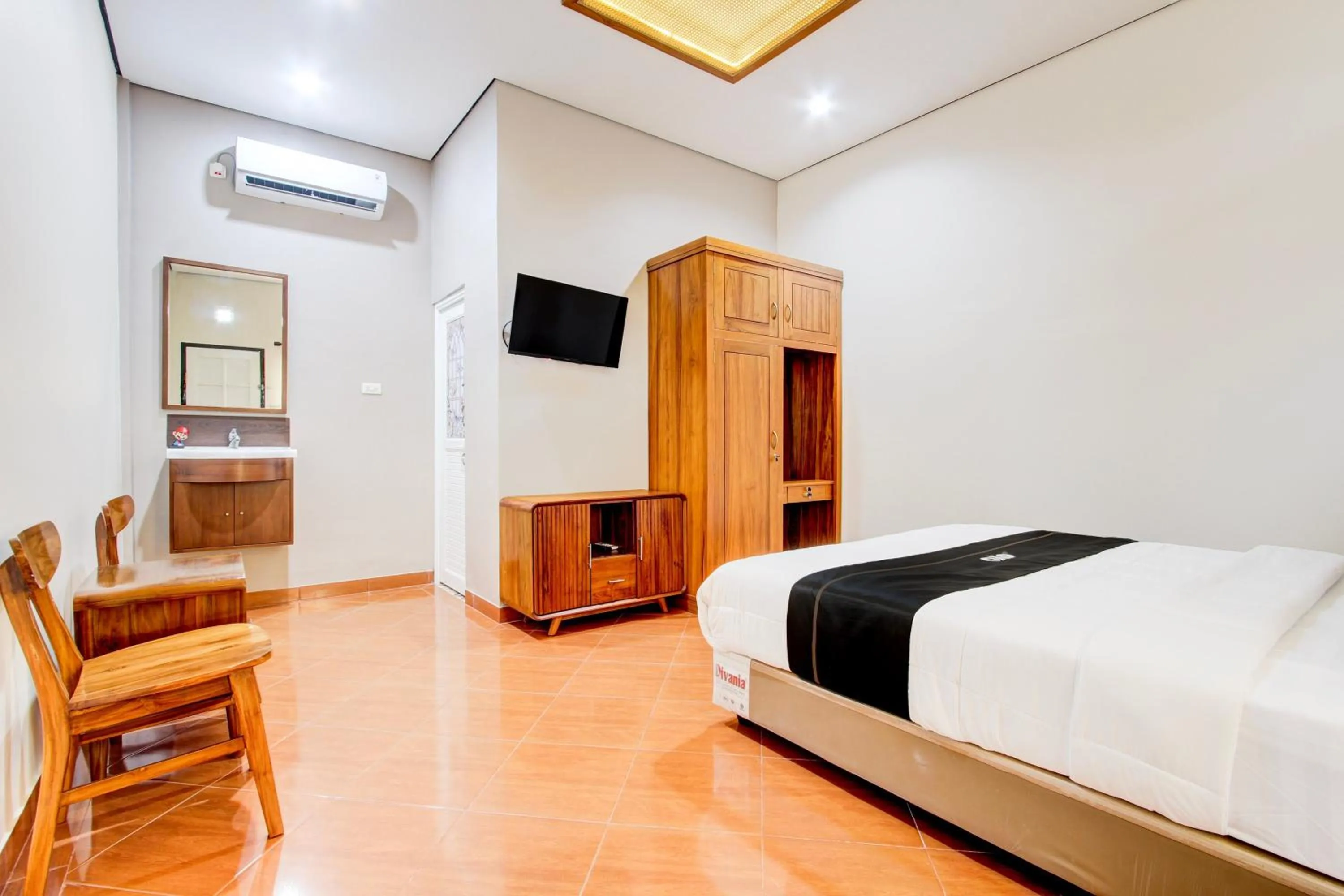 Bedroom in Capital O 93994 Dalem Kamulyan Syariah Guest House