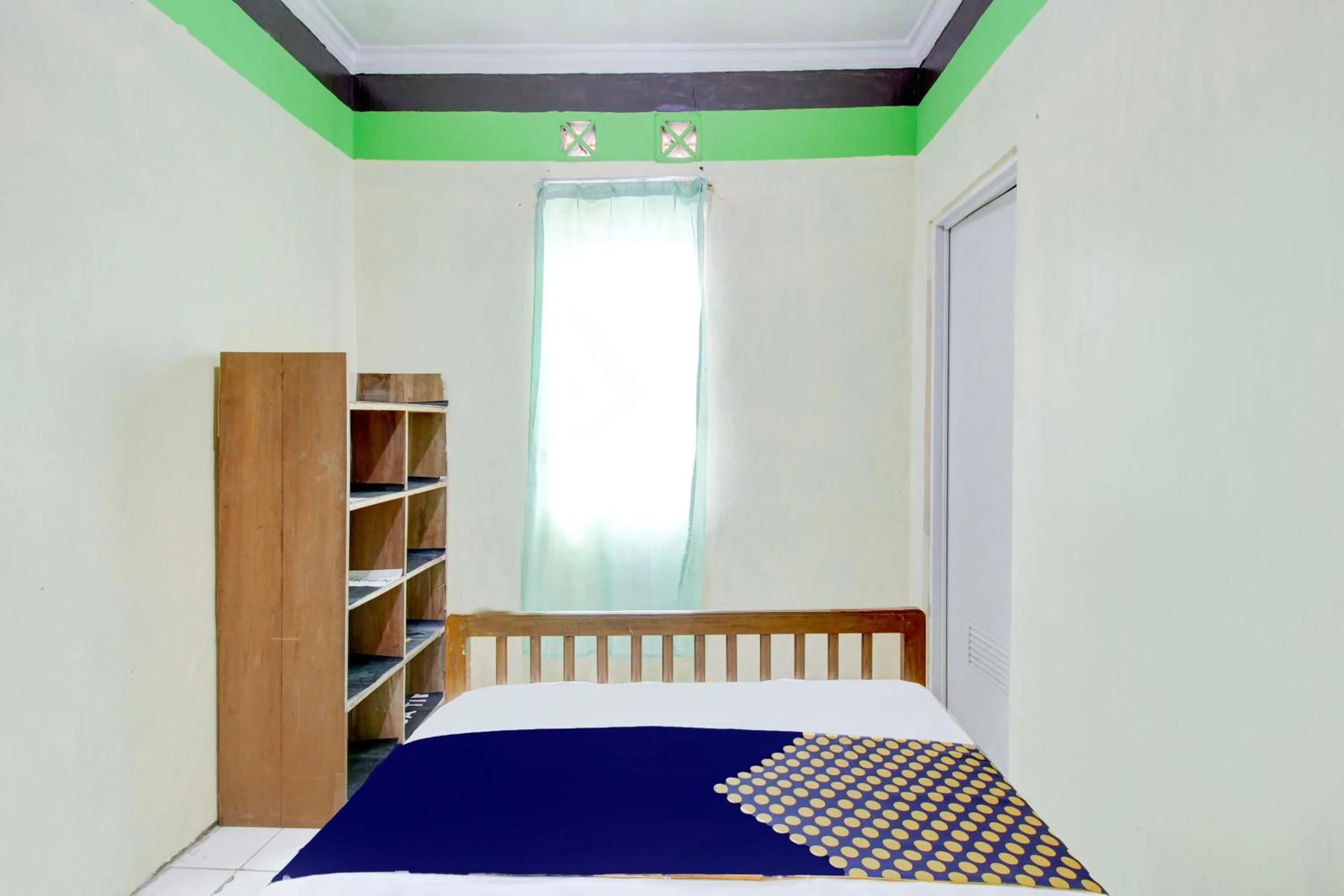 Bedroom in Hotel O Homestay Bintang Syariah