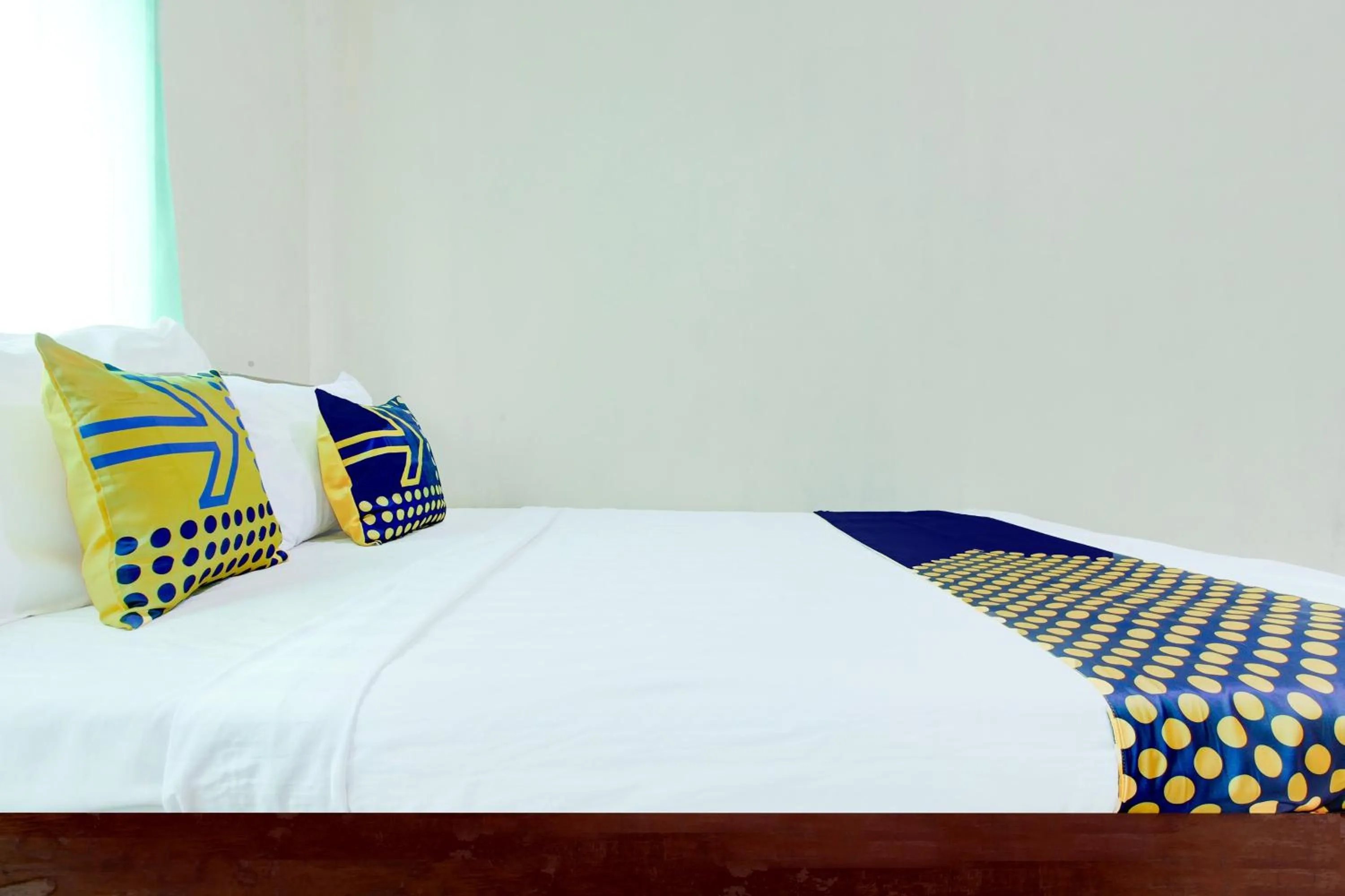 Bedroom in Hotel O Homestay Bintang Syariah