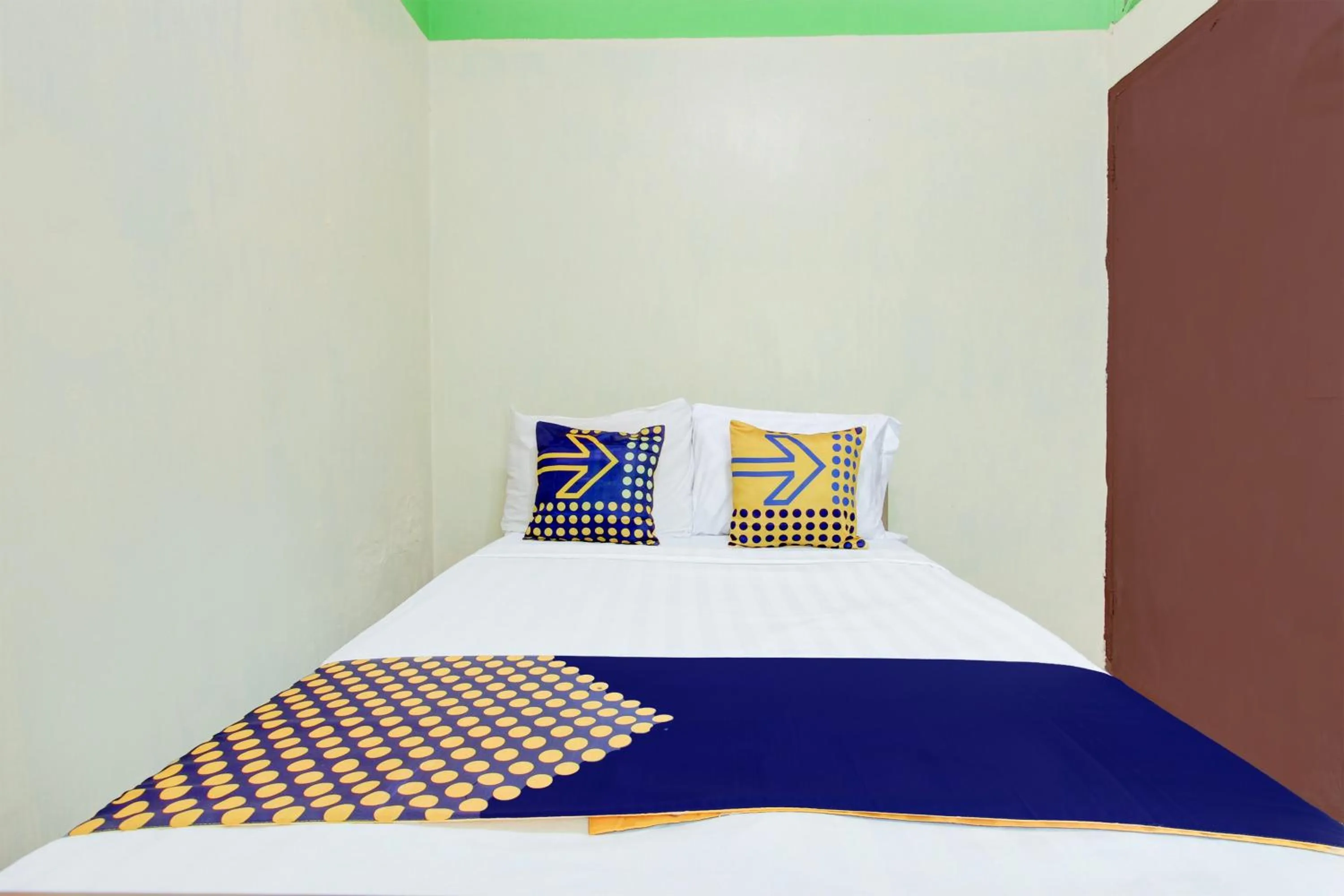Bedroom in Hotel O Homestay Bintang Syariah