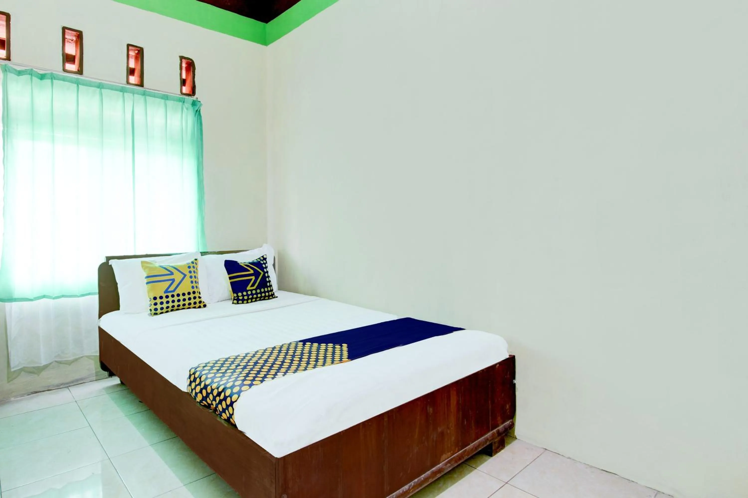 Bedroom in Hotel O Homestay Bintang Syariah
