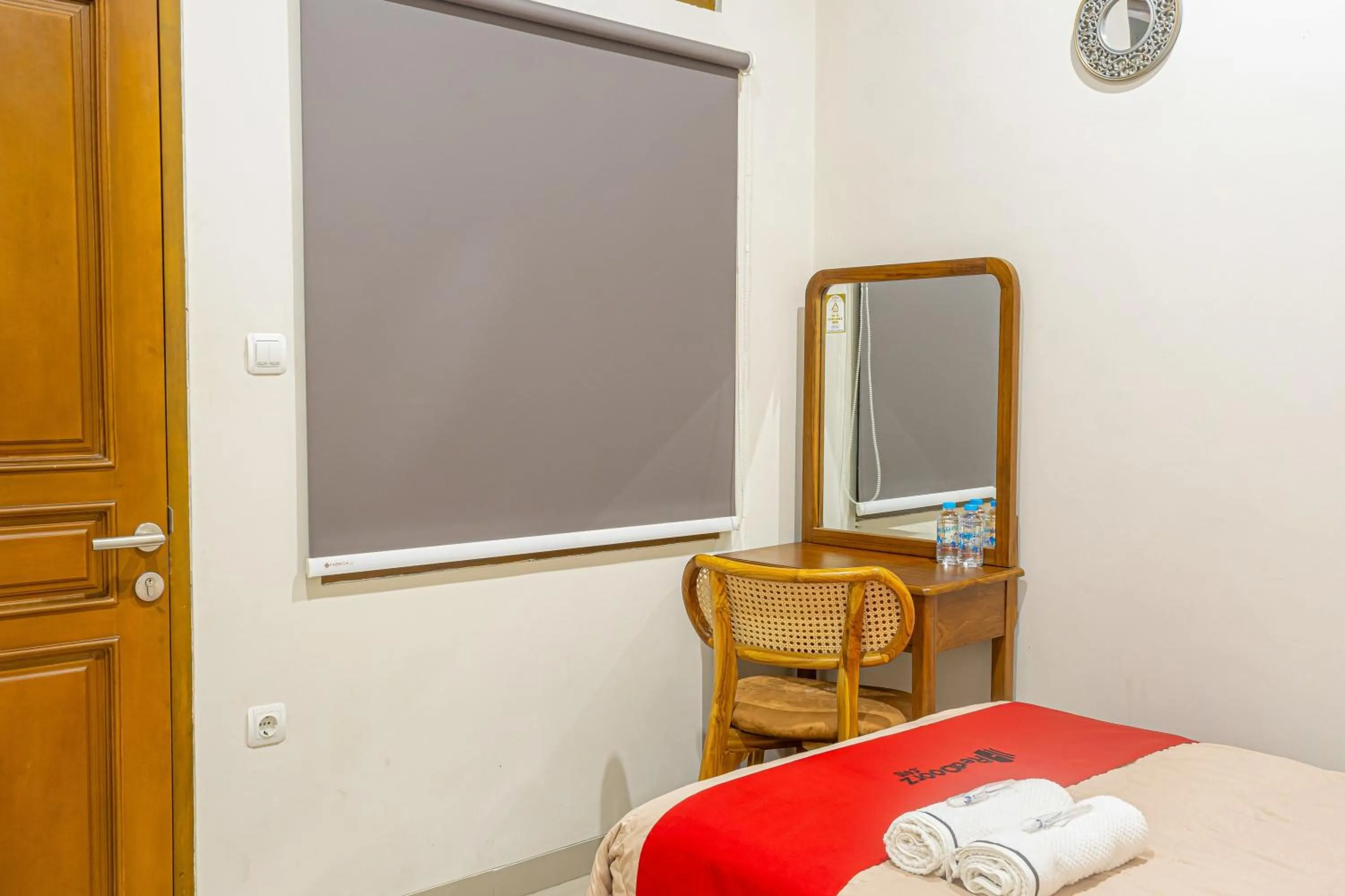 Bedroom, Bed in RedDoorz at Uma Arda Hometown