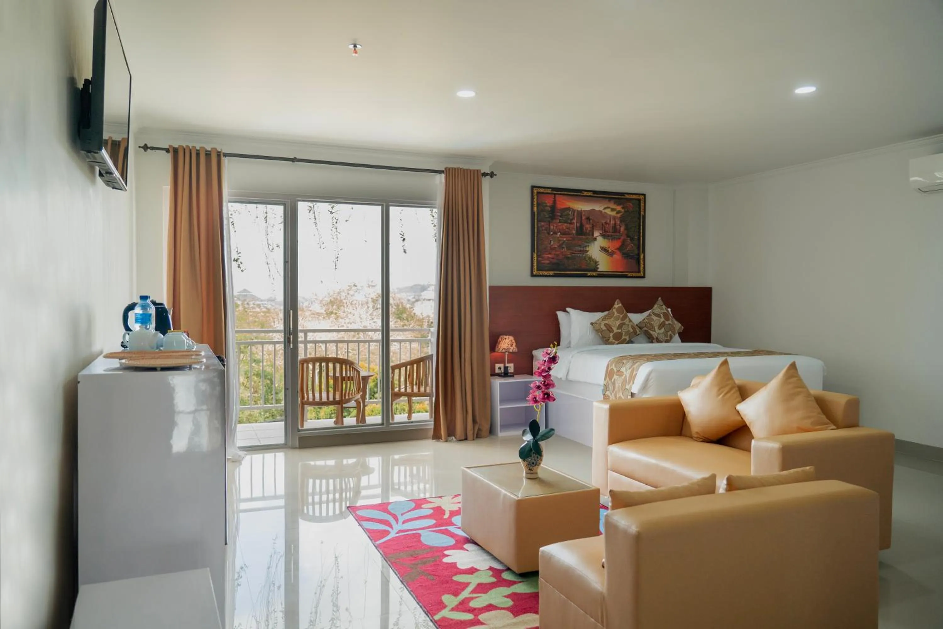 Bed in The Pandan Sari Hotel