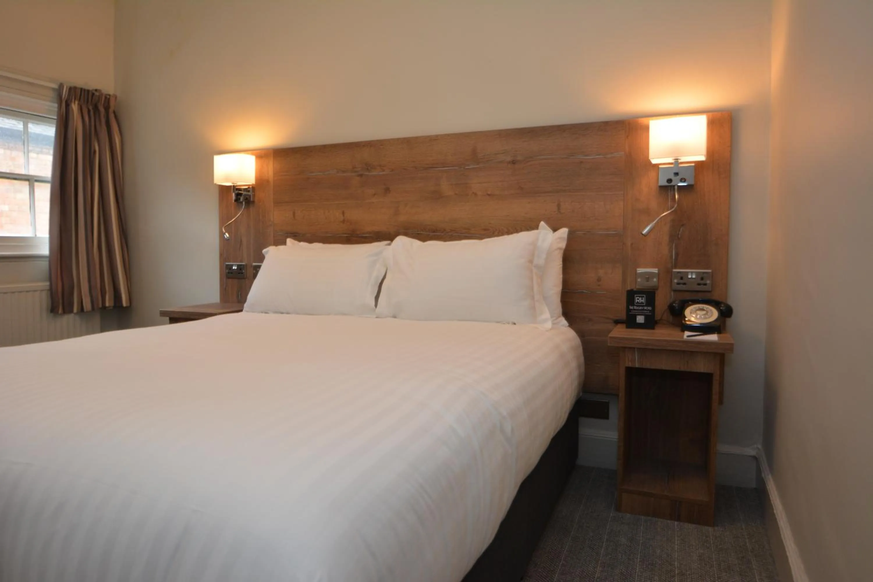 Bed in The Rugby Hotel