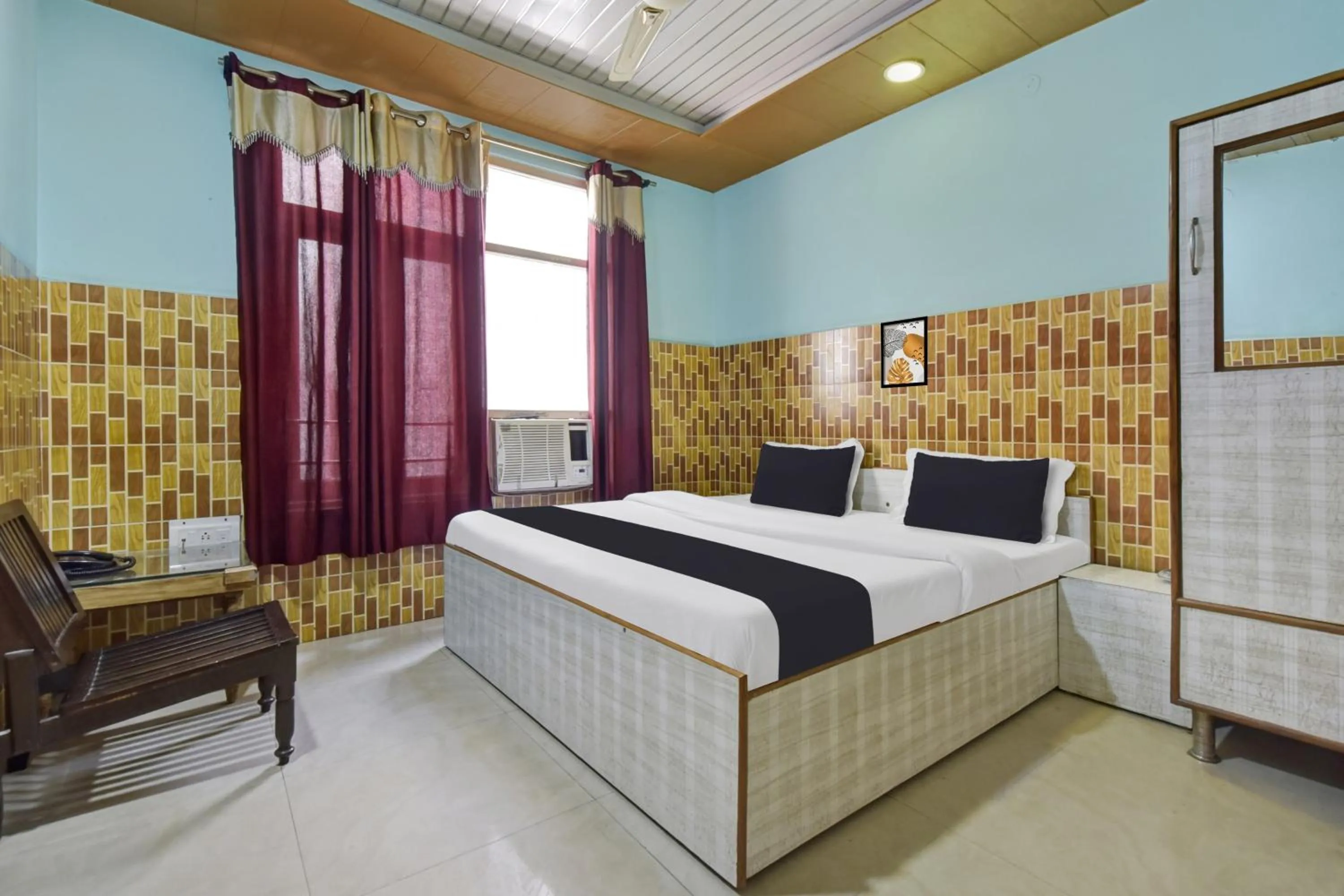 Bedroom in Hotel O Indira