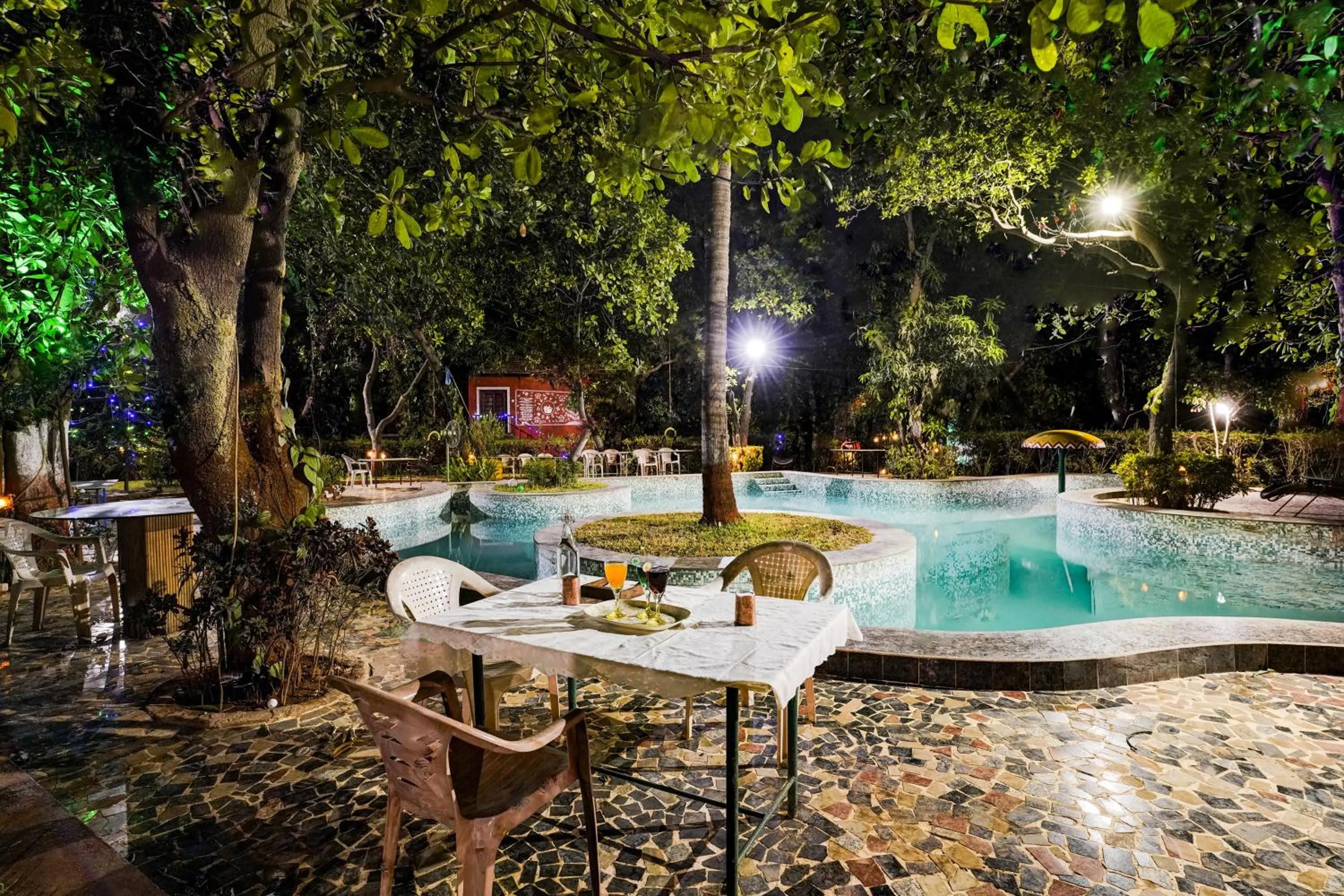 Swimming pool in Palette by CheckIn Palghar Lifestyle Retreat Formerly Irayos Resort