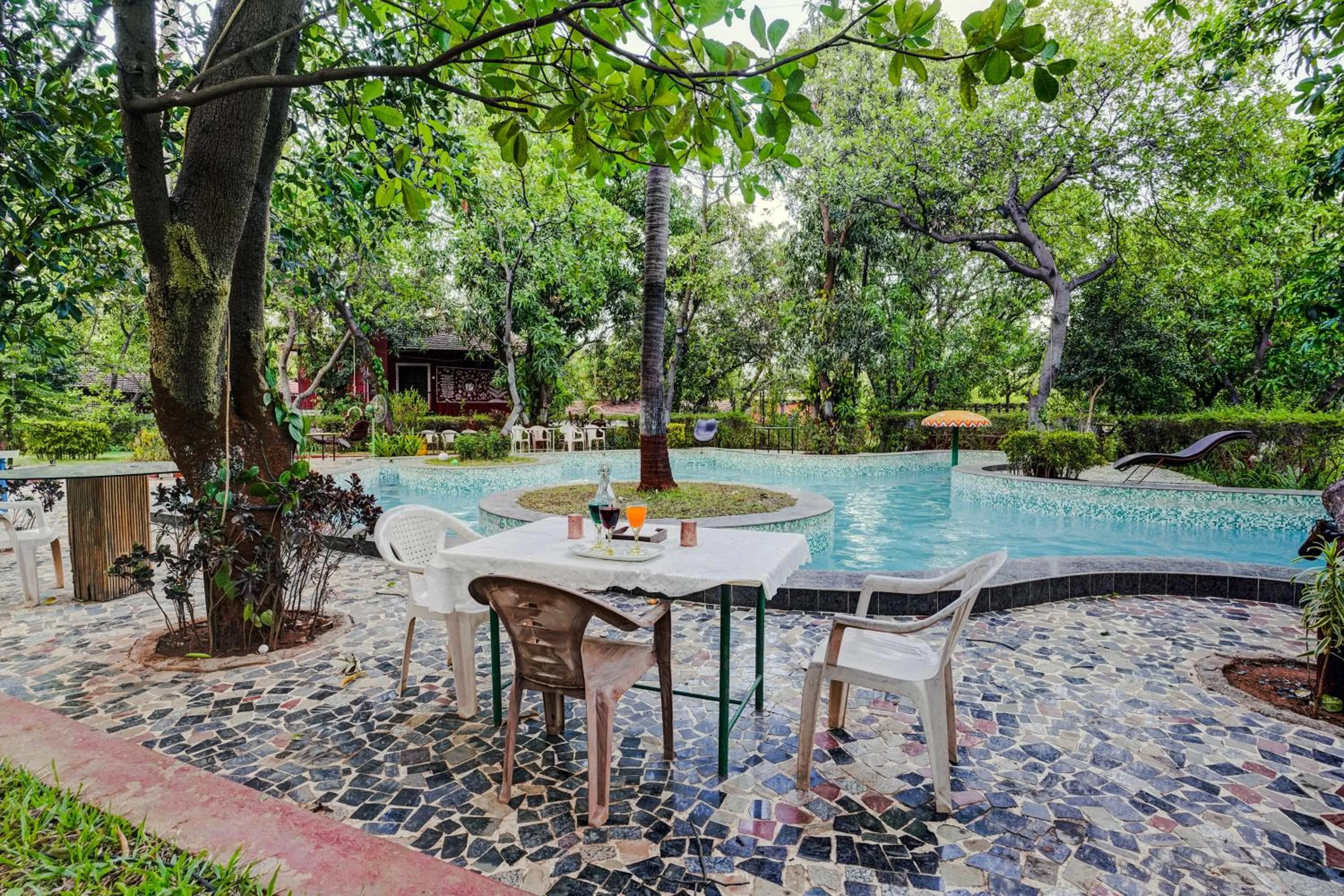 Swimming pool in Palette by CheckIn Palghar Lifestyle Retreat Formerly Irayos Resort