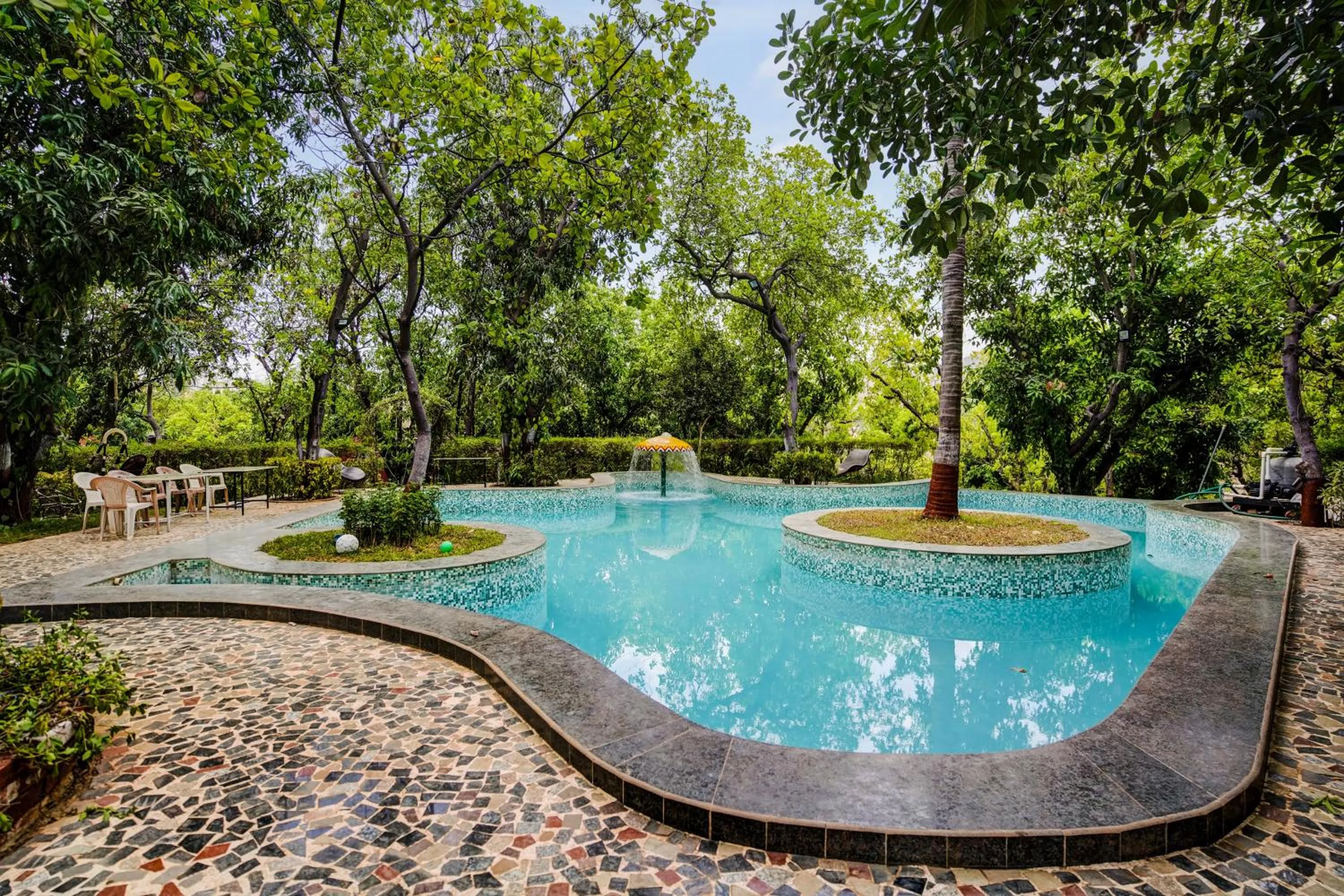 Swimming pool in Palette by CheckIn Palghar Lifestyle Retreat Formerly Irayos Resort