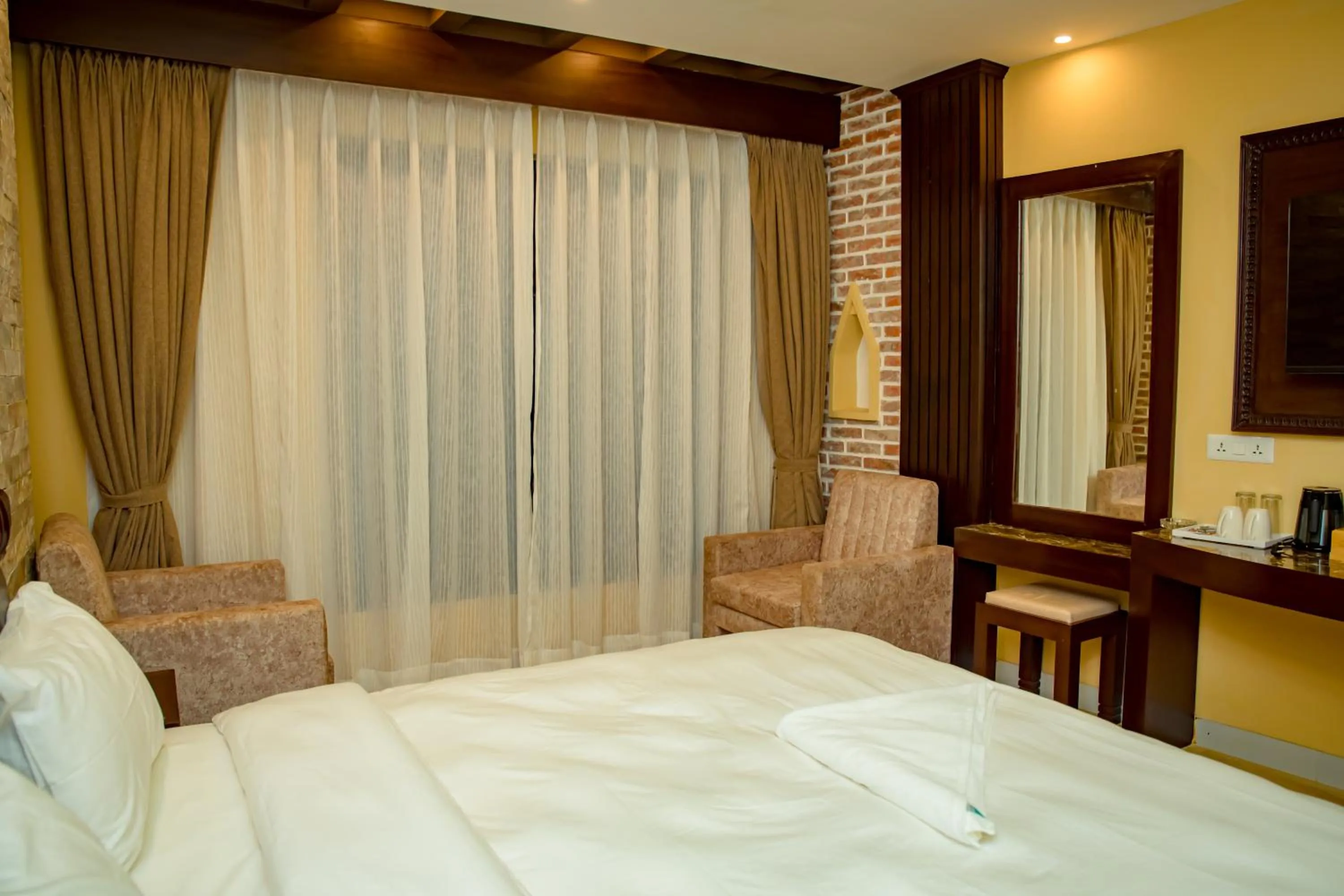 Bed in Hotel Matina Suites