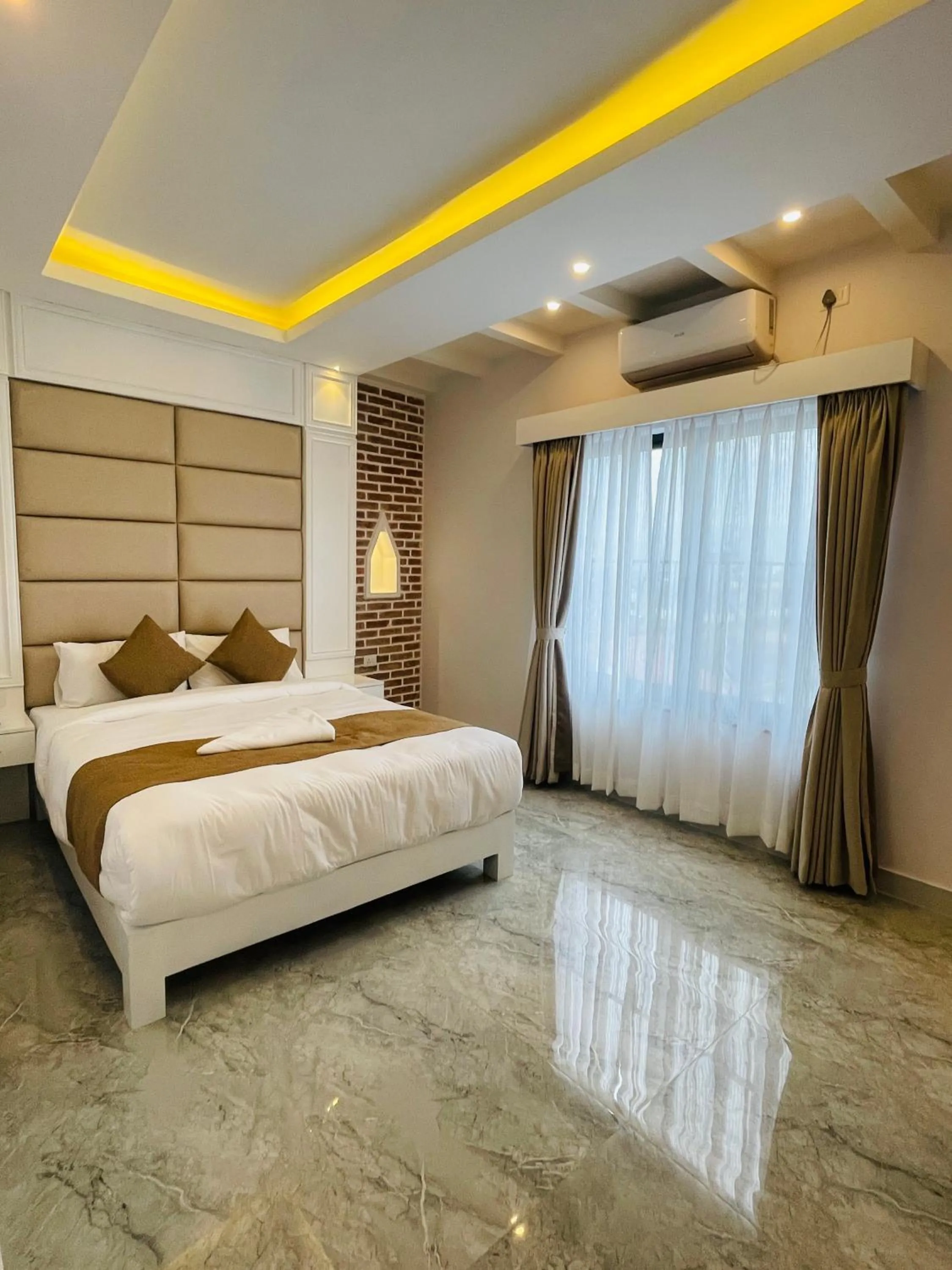 Bed in Hotel Matina Suites