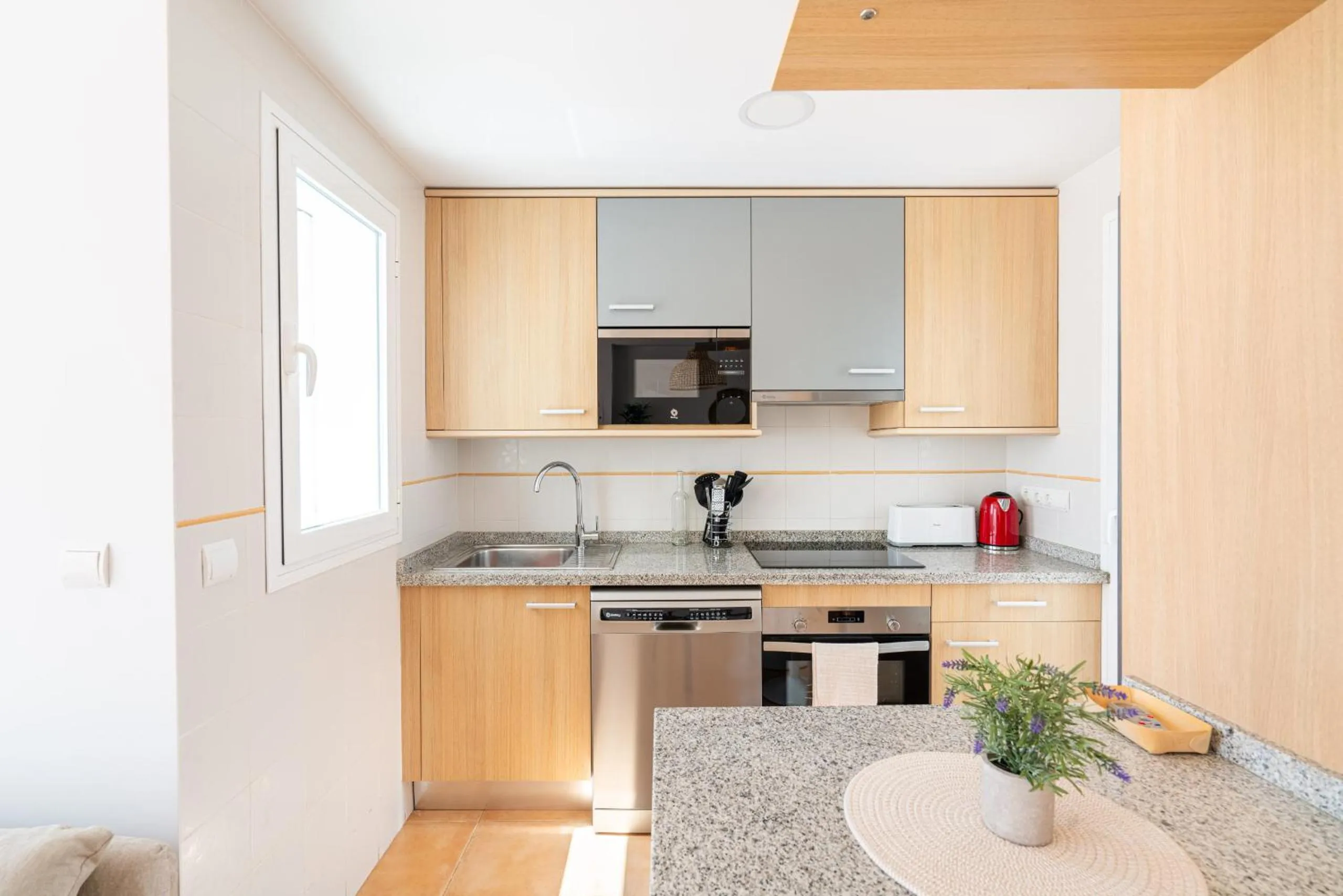 Kitchen or kitchenette in AlmeriaSuite Mojacar Breeze Apartments