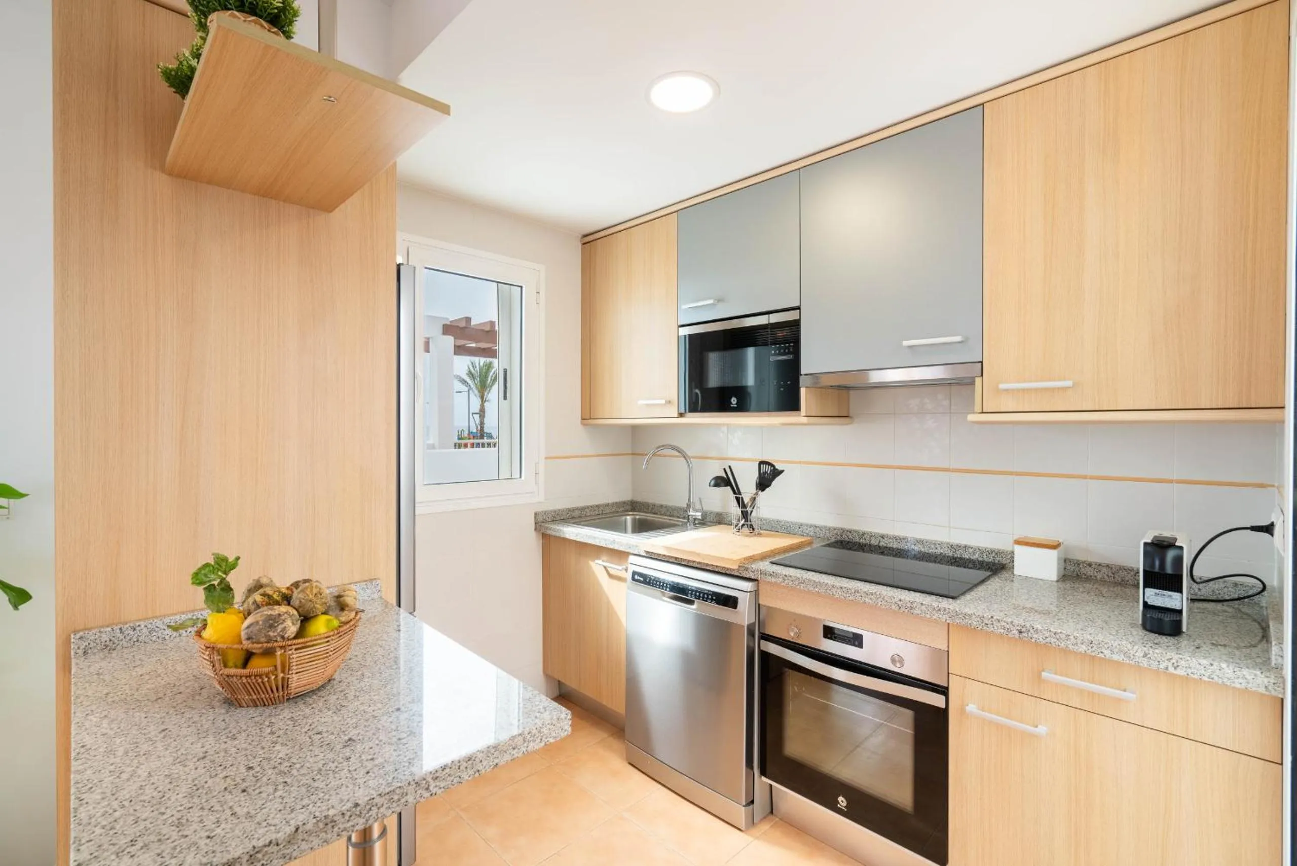 Kitchen or kitchenette in AlmeriaSuite Mojacar Breeze Apartments