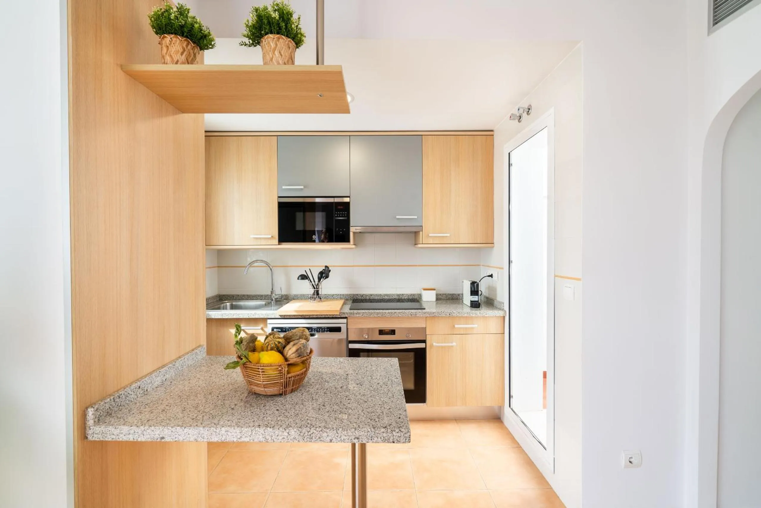 Kitchen or kitchenette in AlmeriaSuite Mojacar Breeze Apartments