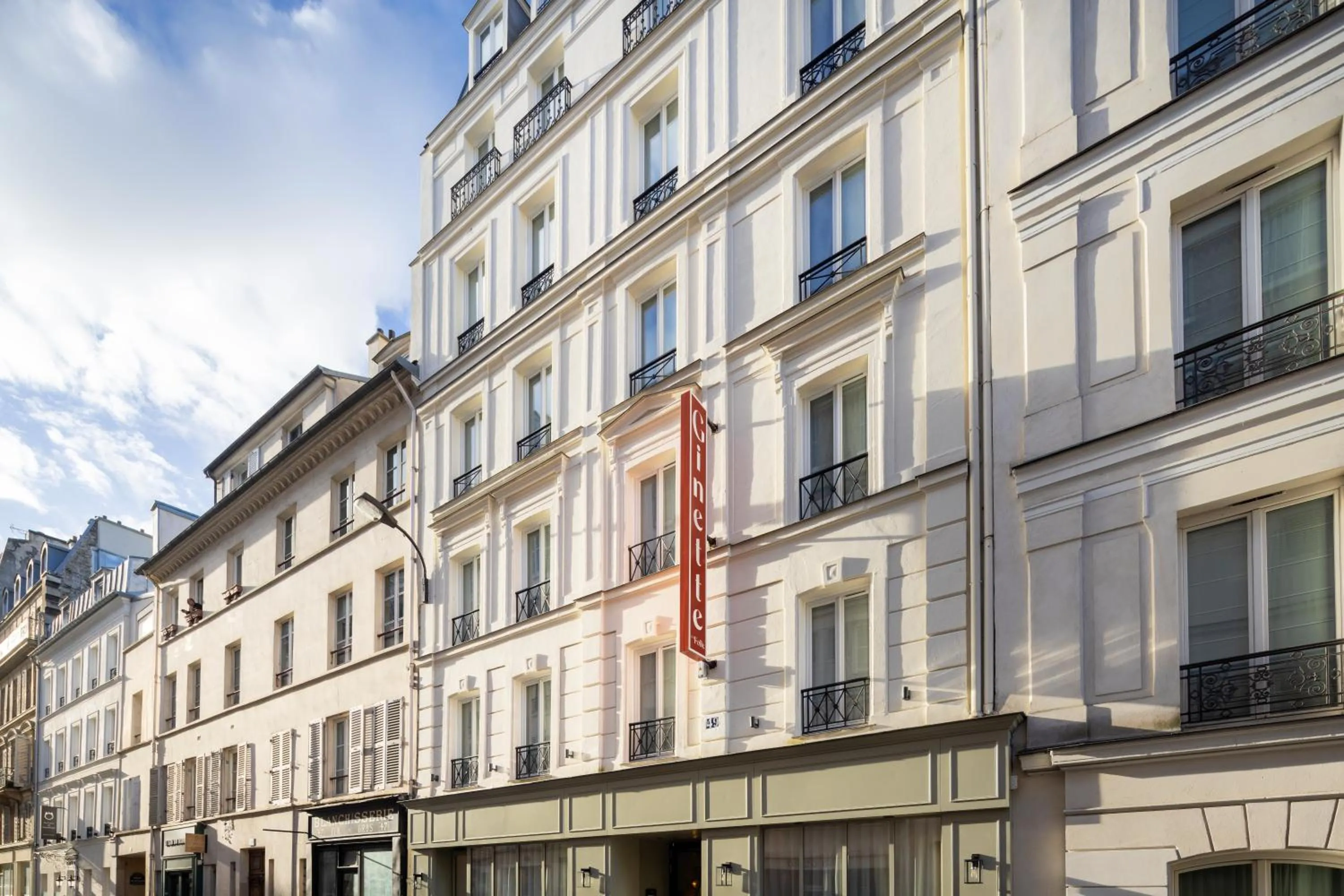 Property building in Hôtel Ginette à la Folie & Spa