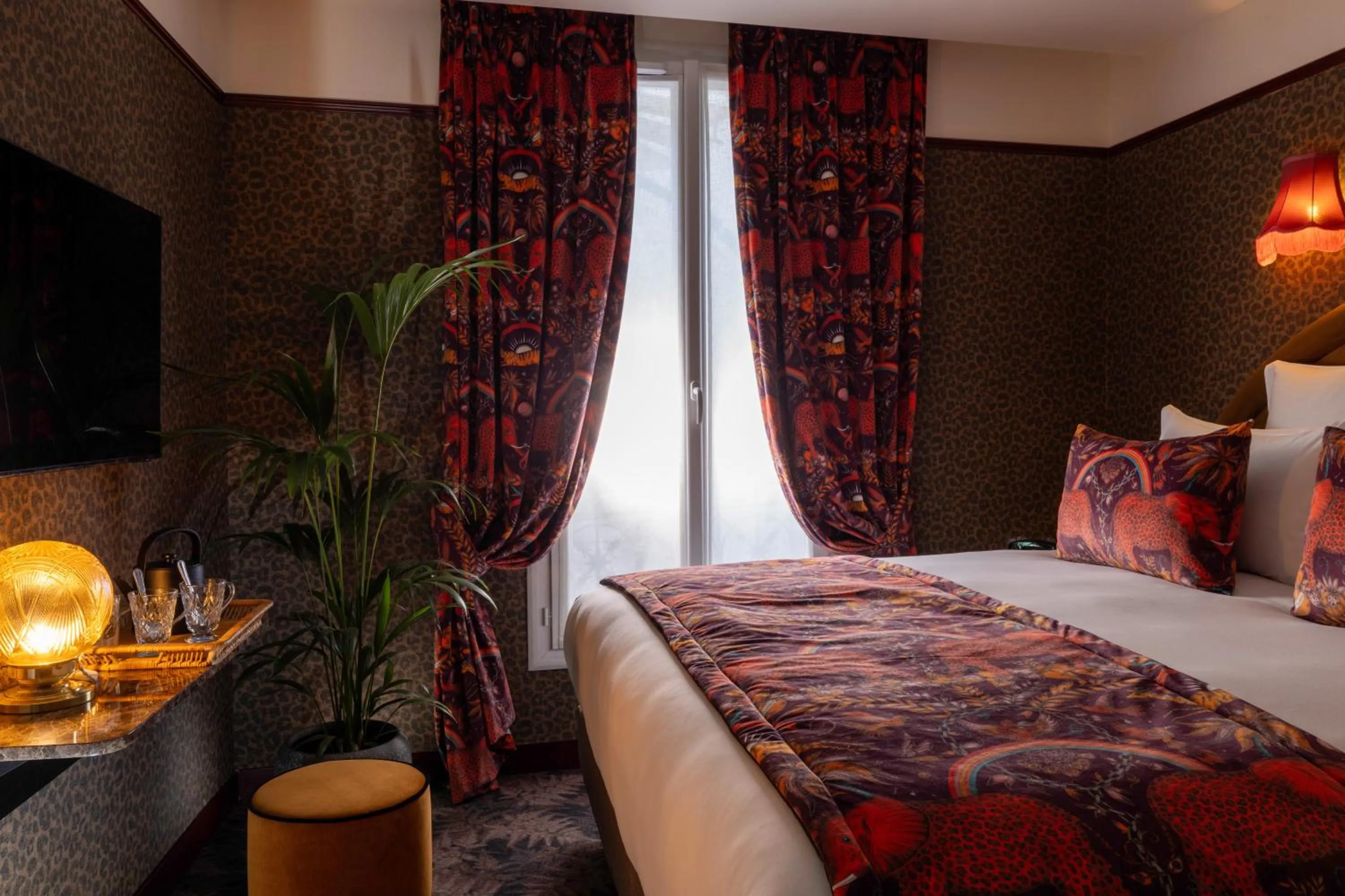 Bed in Hôtel Ginette à la Folie & Spa