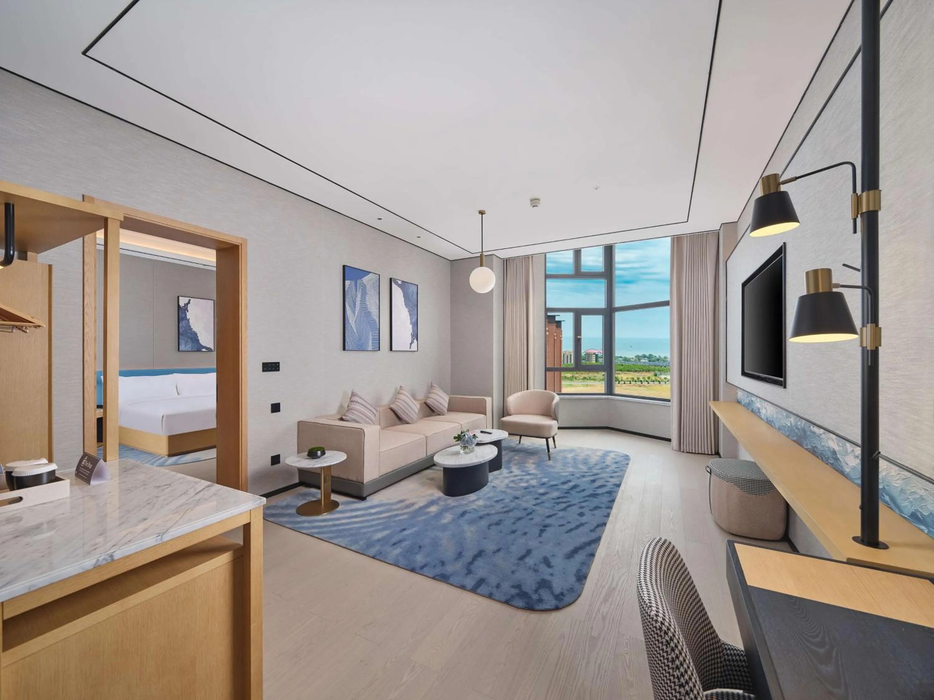 Living room, Bed in Hilton Garden Inn Huludao Longxing Road