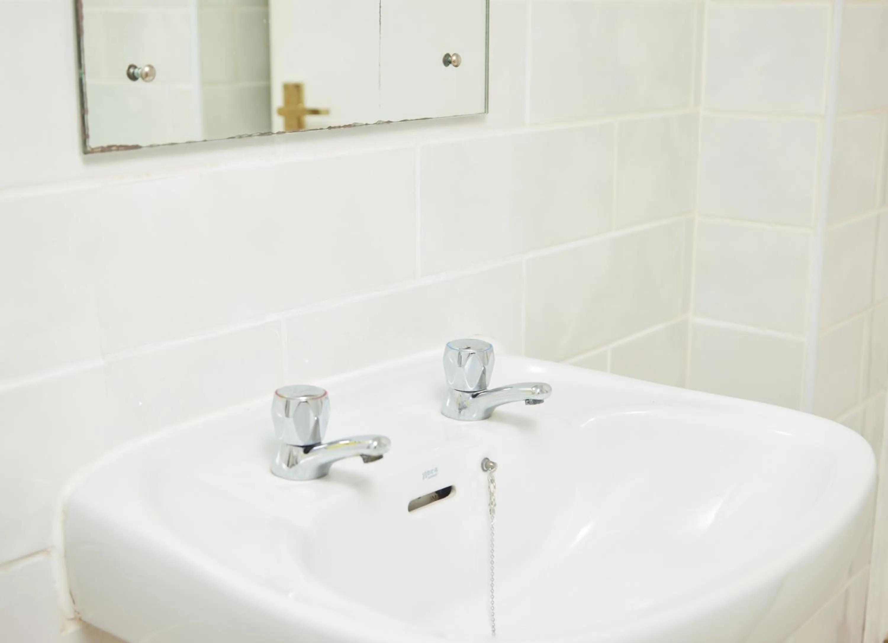 Bathroom in Cock Hotel by Greene King Inns