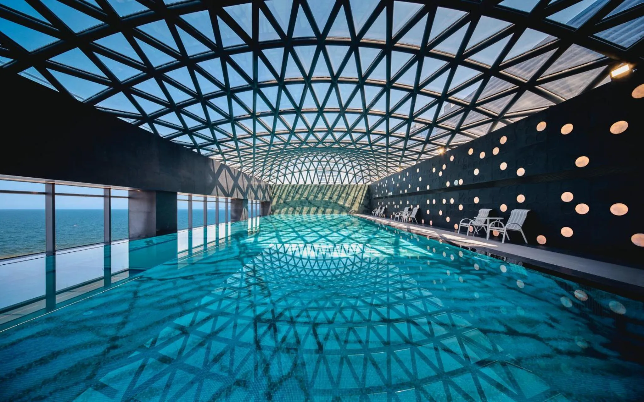 Swimming pool in Hotel Indigo Yantai Golden Coast by IHG