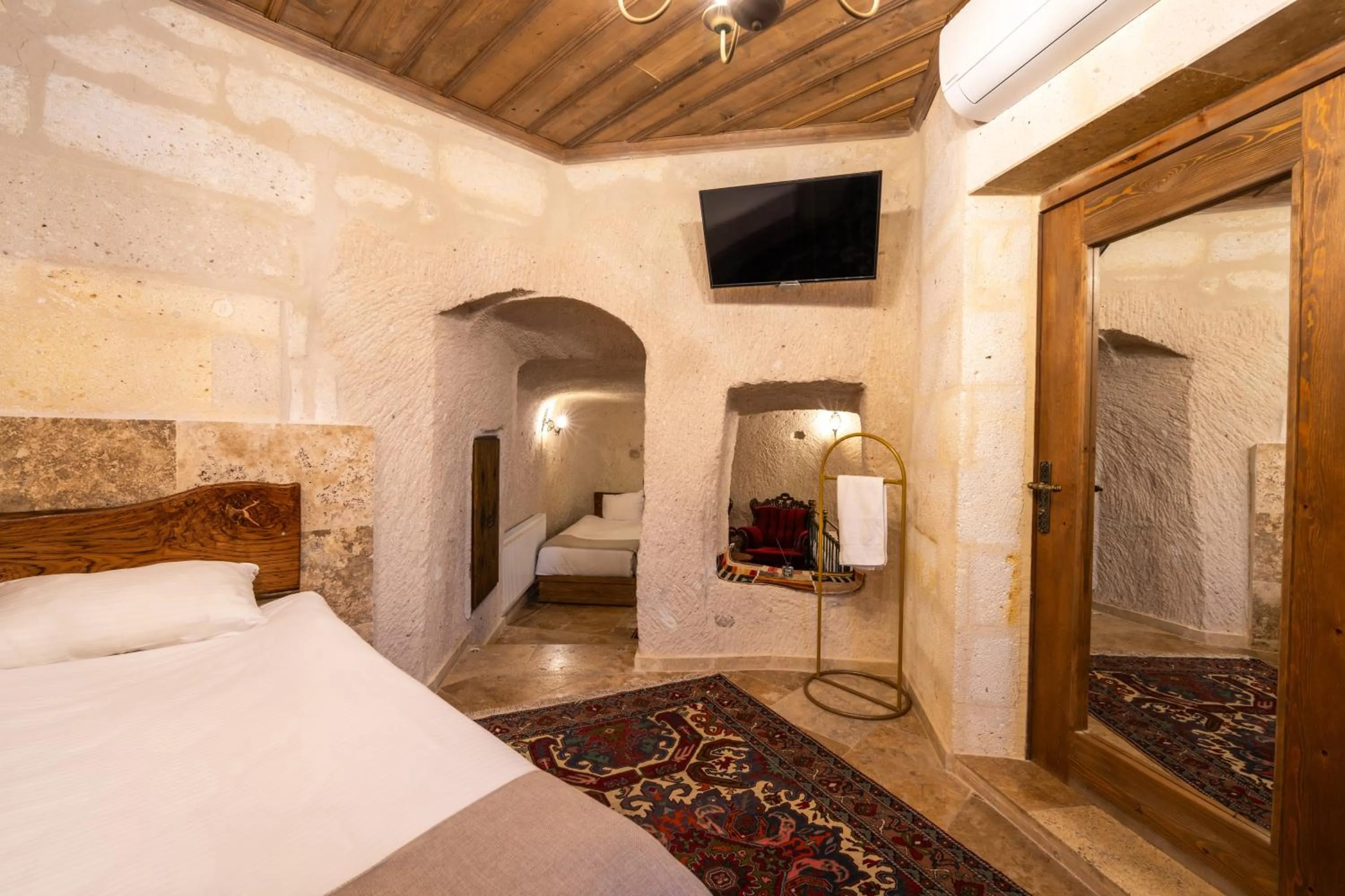 Bed in Library Cave House