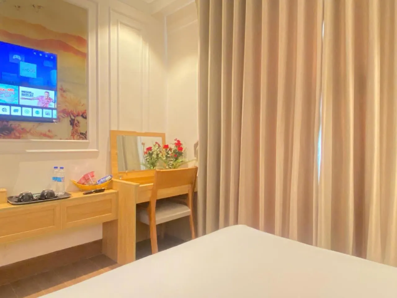 Seating area, Bed in MiAn Hotel Danang - Infinity Pool