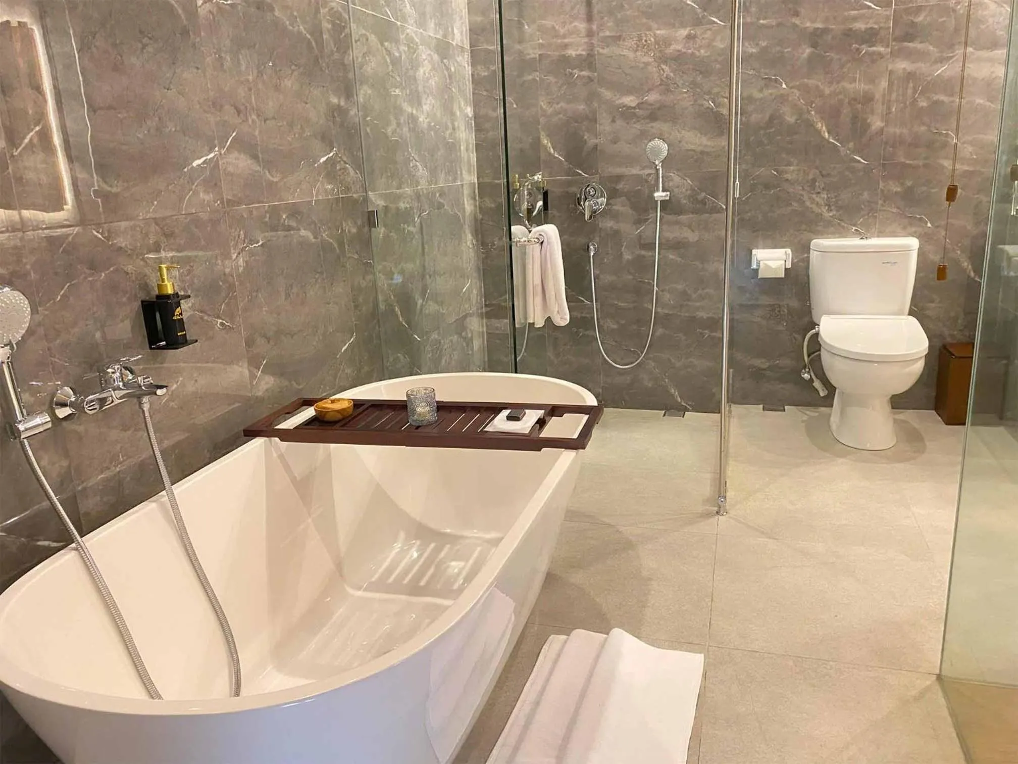 Shower in The Prime Canggu Bali by Kanaya Hospitality