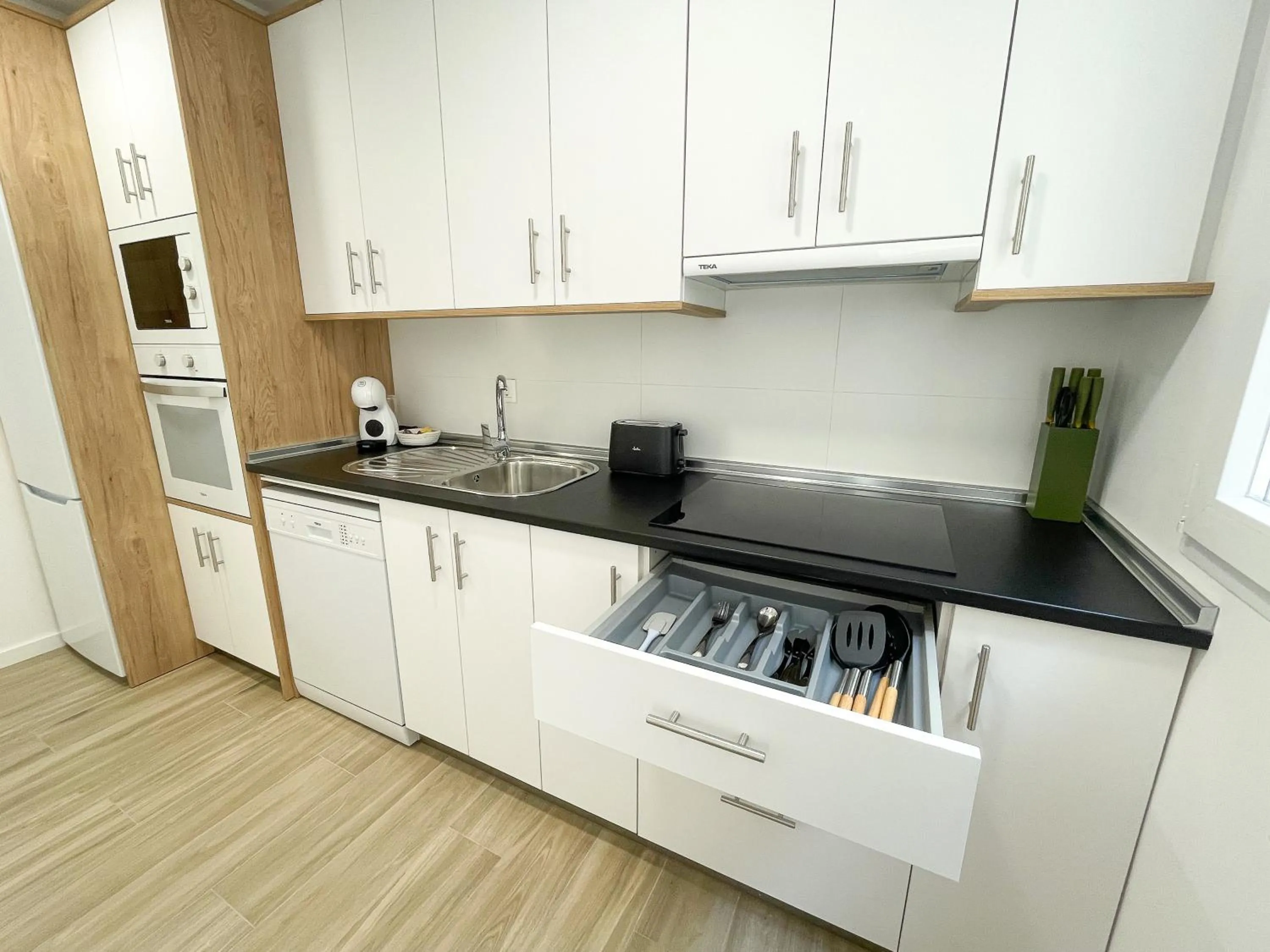 Kitchen or kitchenette in Apartamentos Zaragoza Gran Vía 3000