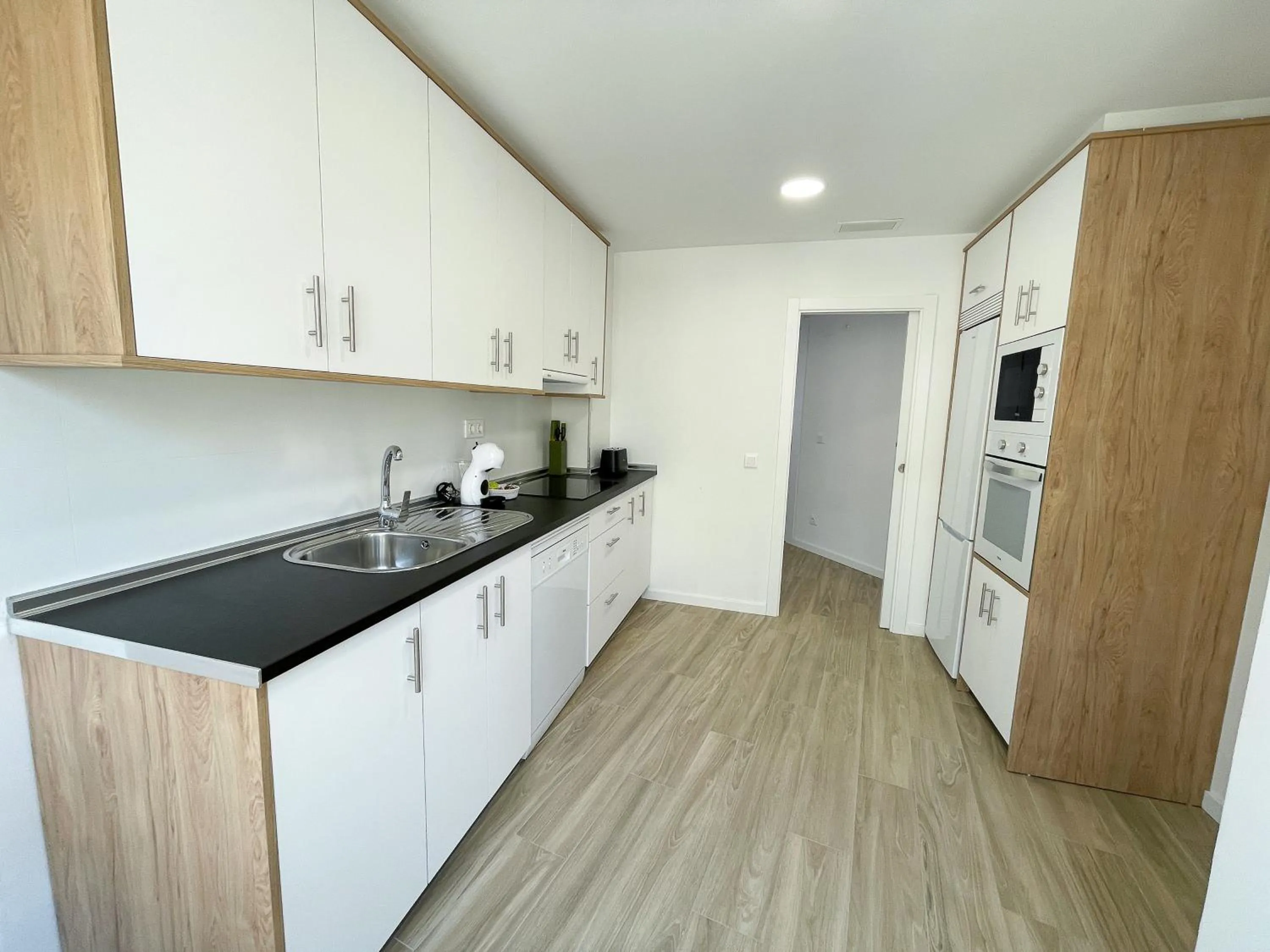 Kitchen or kitchenette in Apartamentos Zaragoza Gran Vía 3000