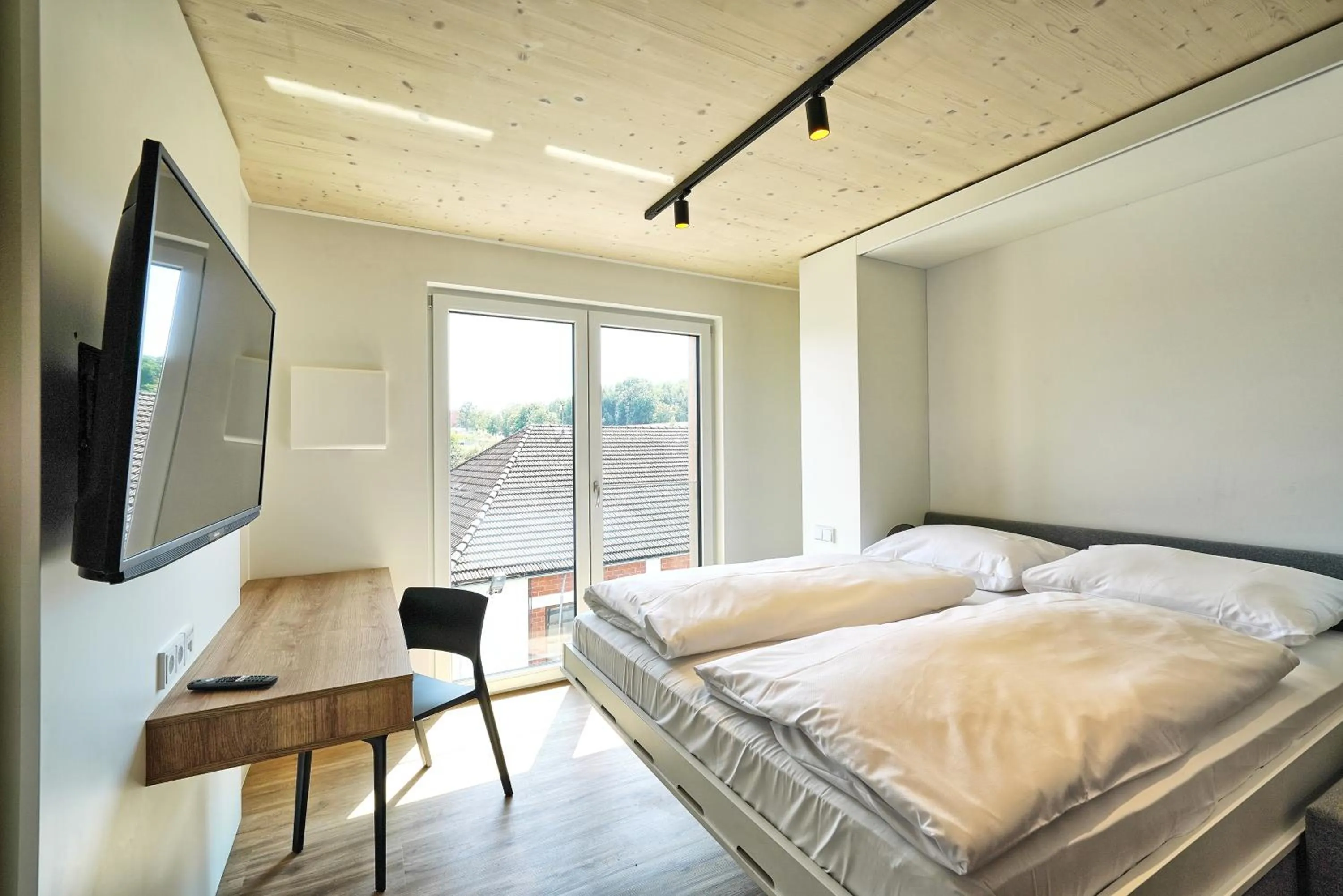 Bedroom, Bed in Timber One Boardinghouse Dorfen