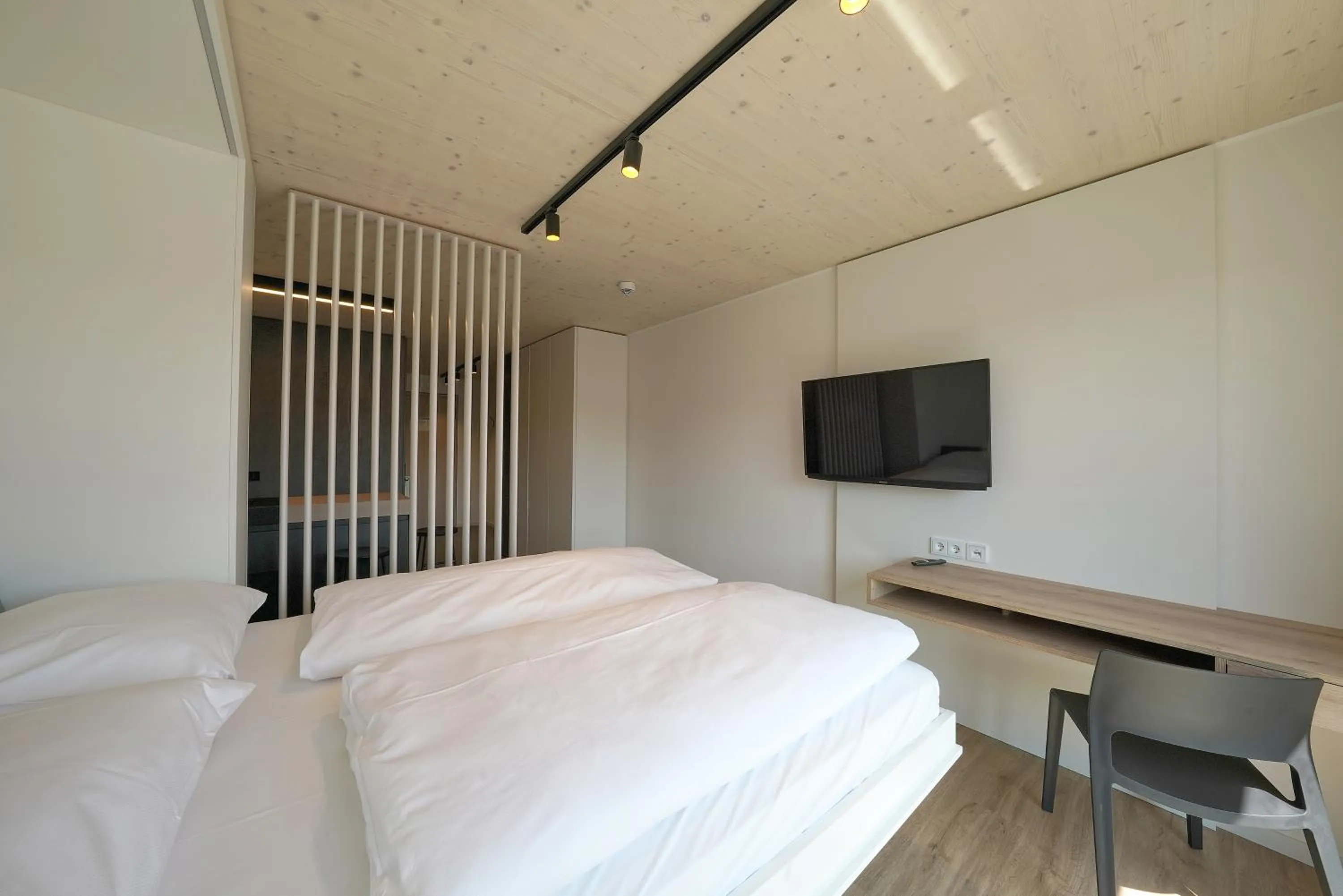 Bedroom, Bed in Timber One Boardinghouse Dorfen