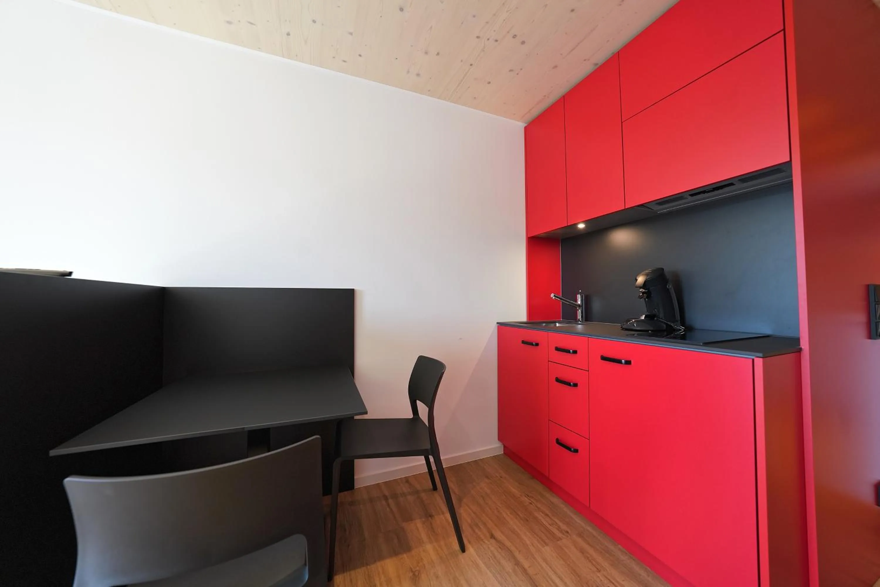 Kitchen or kitchenette in Timber One Boardinghouse Dorfen