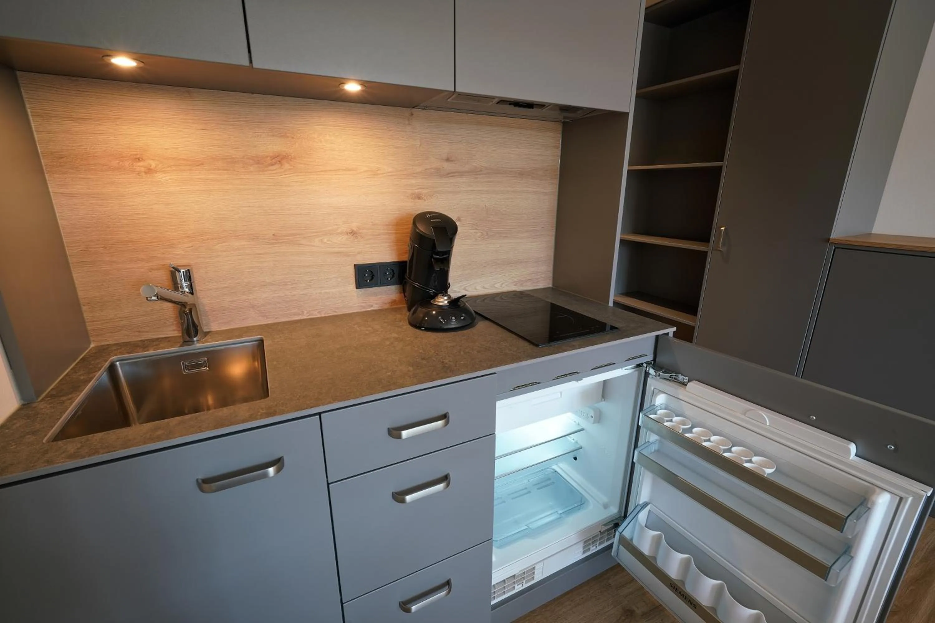 Kitchen or kitchenette in Timber One Boardinghouse Dorfen