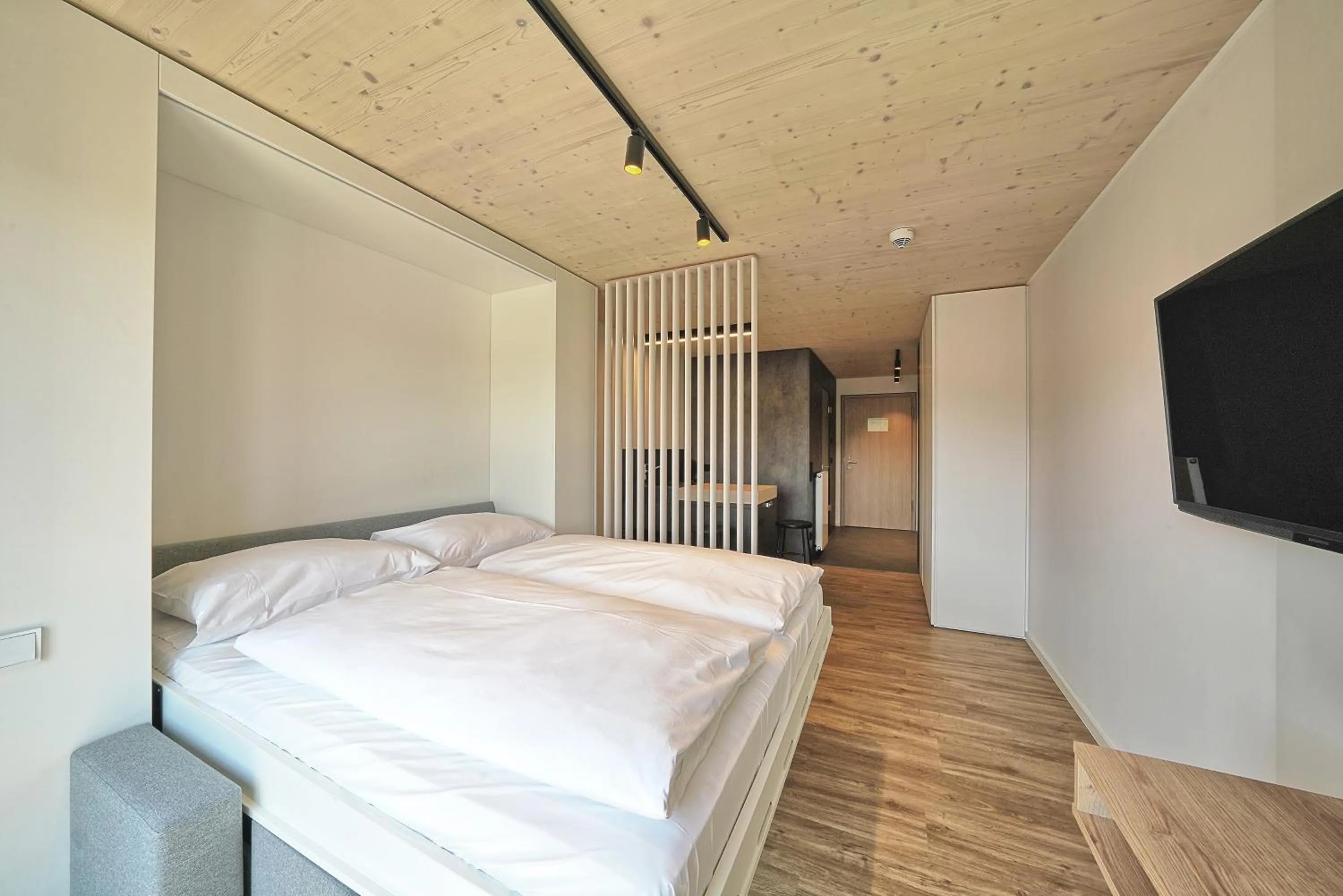 Photo of the whole room, Bed in Timber One Boardinghouse Dorfen
