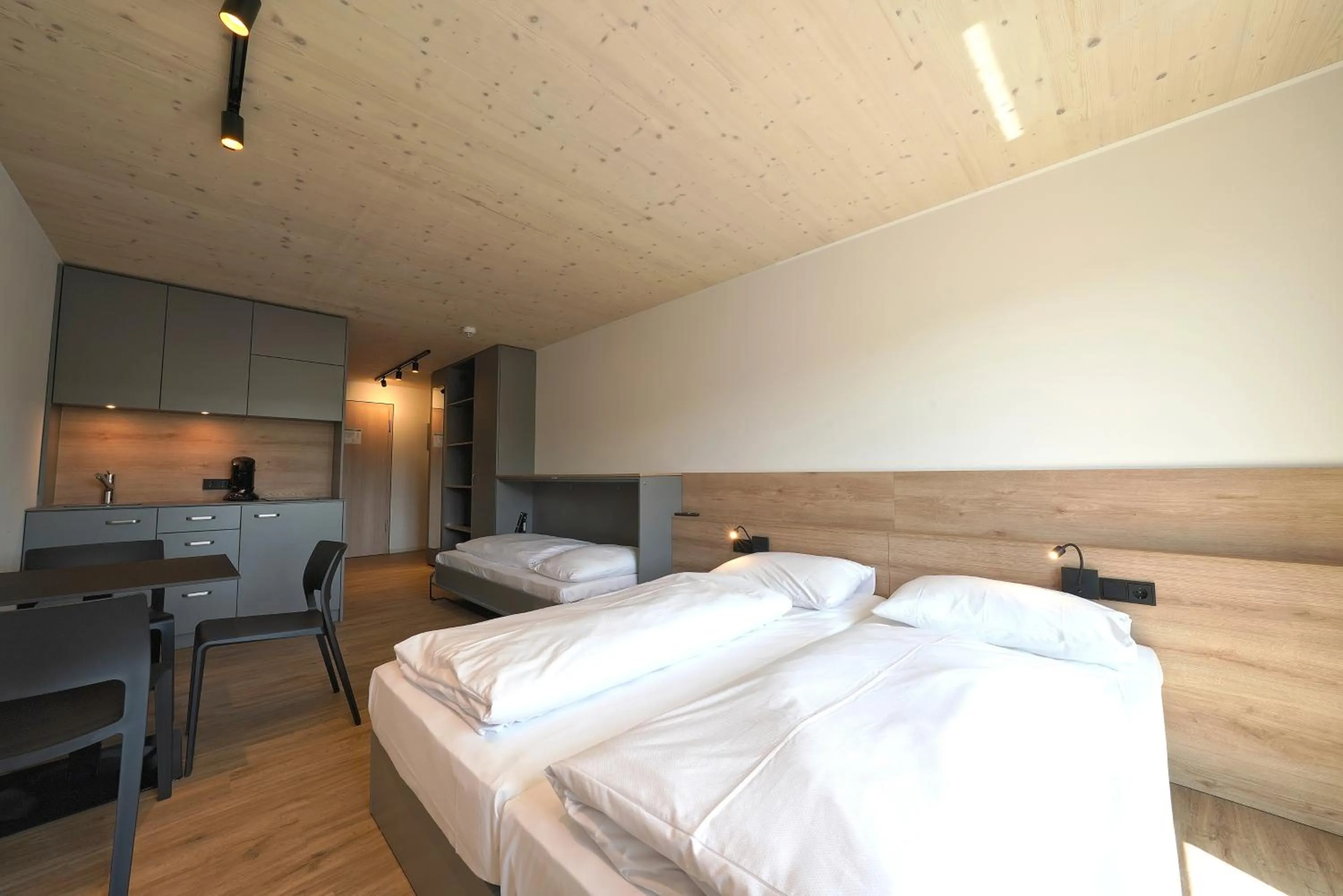 Photo of the whole room, Bed in Timber One Boardinghouse Dorfen