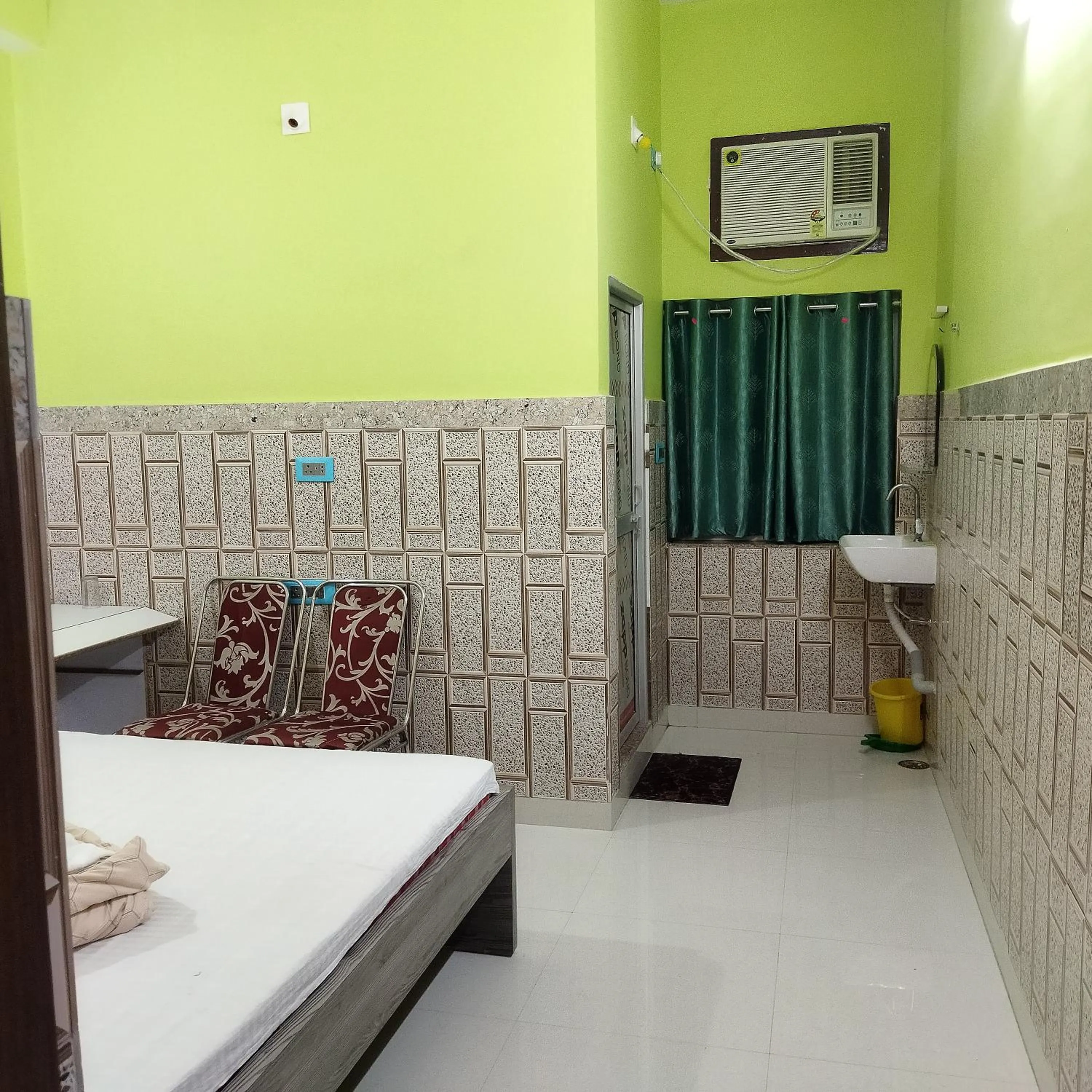 Bed in Hotel Bhagwat Palace